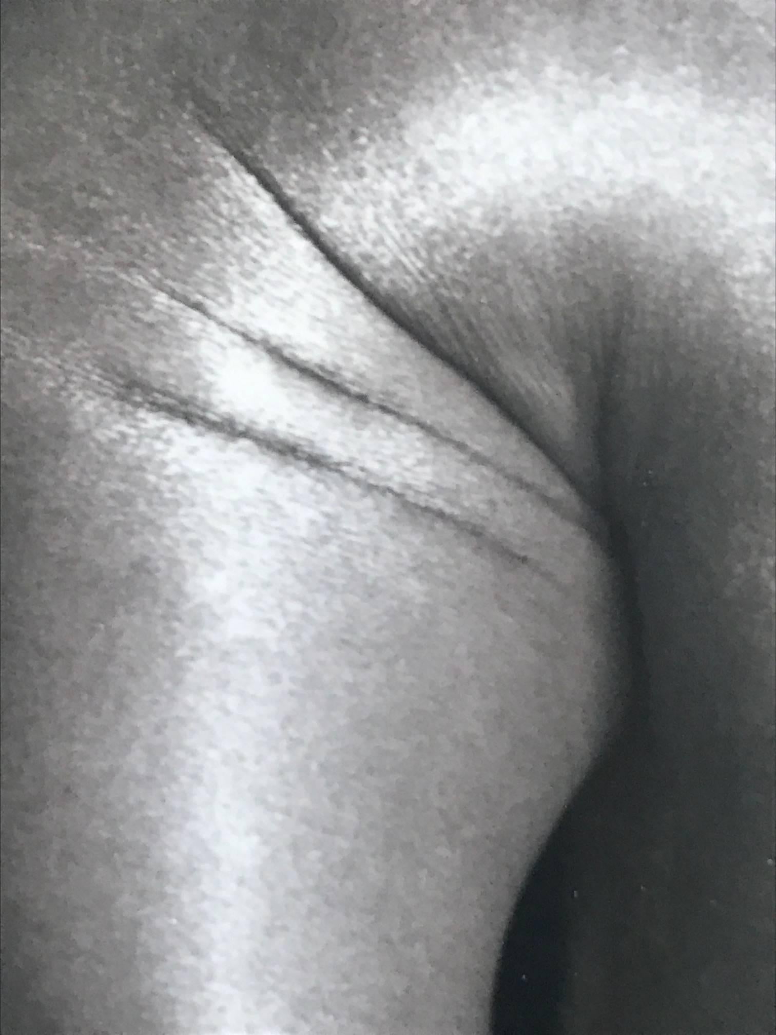 An classic photo by Herb Ritts of actress Demi Moore, stamped and pencil signed 