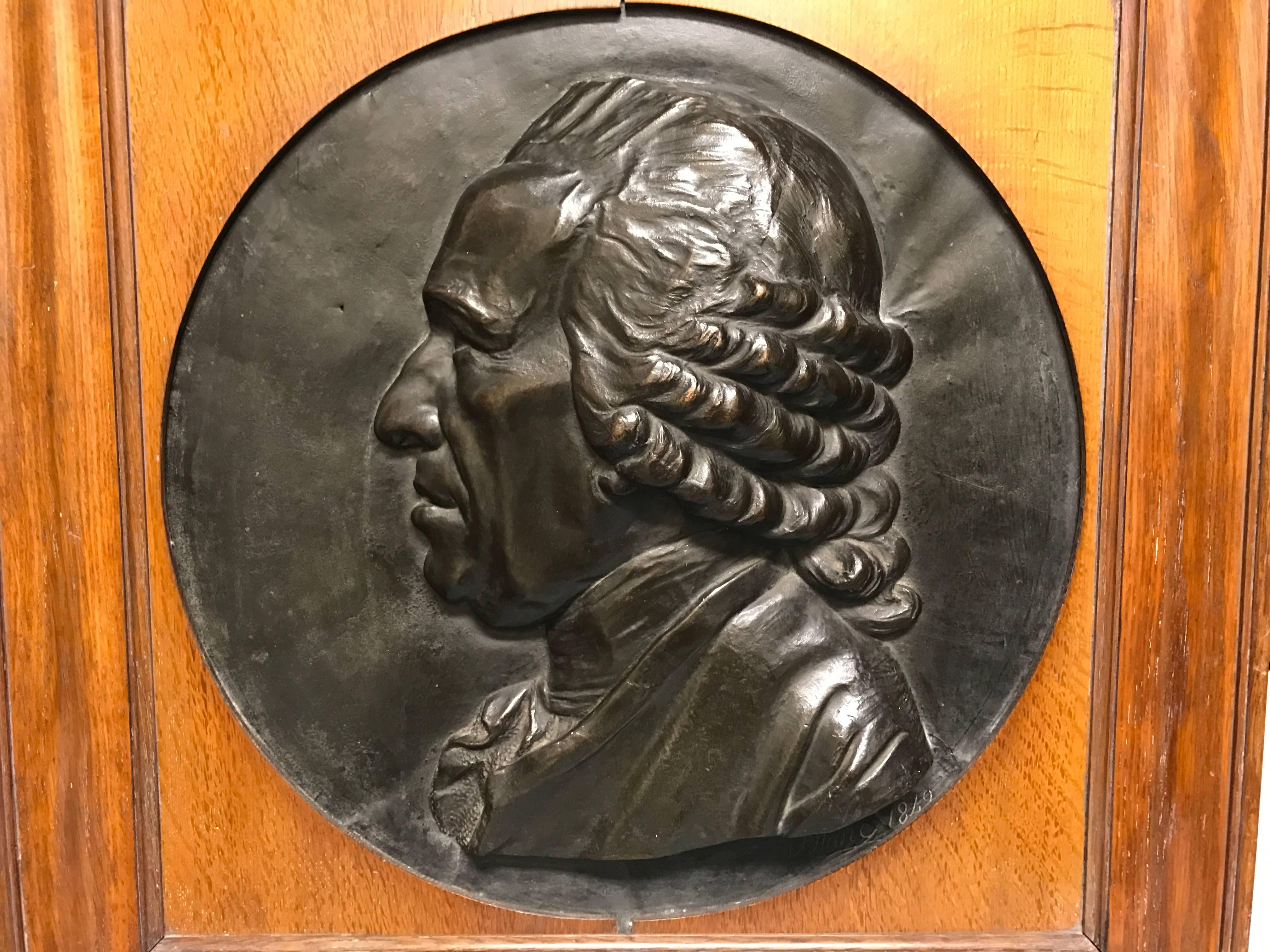 A portrait bust in relief of a French luminary or nobleman in copper repousse with a rich black patina. Mounted in the original oak frame. Signed and dated 'Blanc 1849'. 

Armand Blanc was a sculptor born in Dijon; died c. 1860. A pupil of David