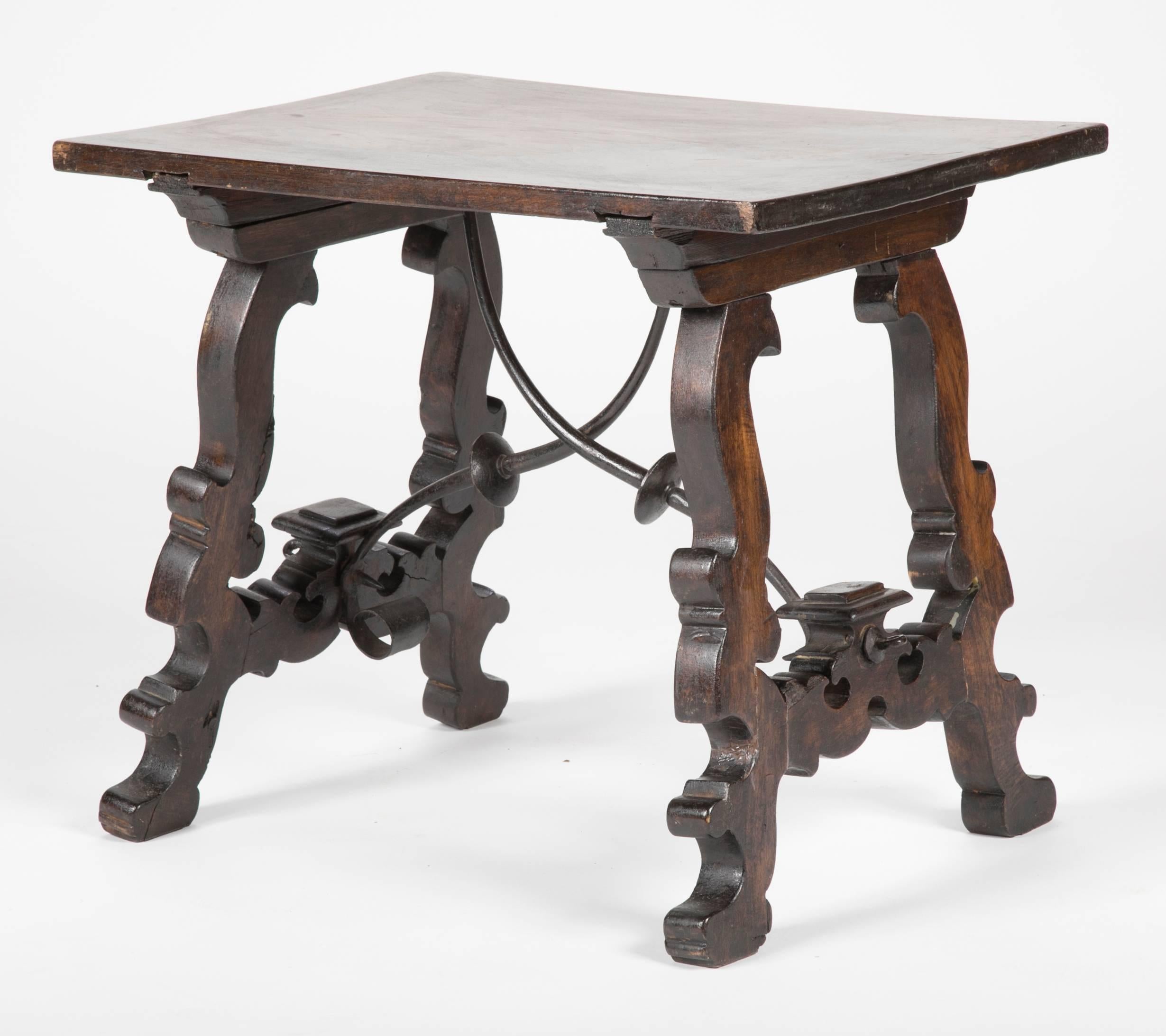 Carved 19th Century Spanish Baroque Style Walnut Side Table with Iron Stretchers For Sale