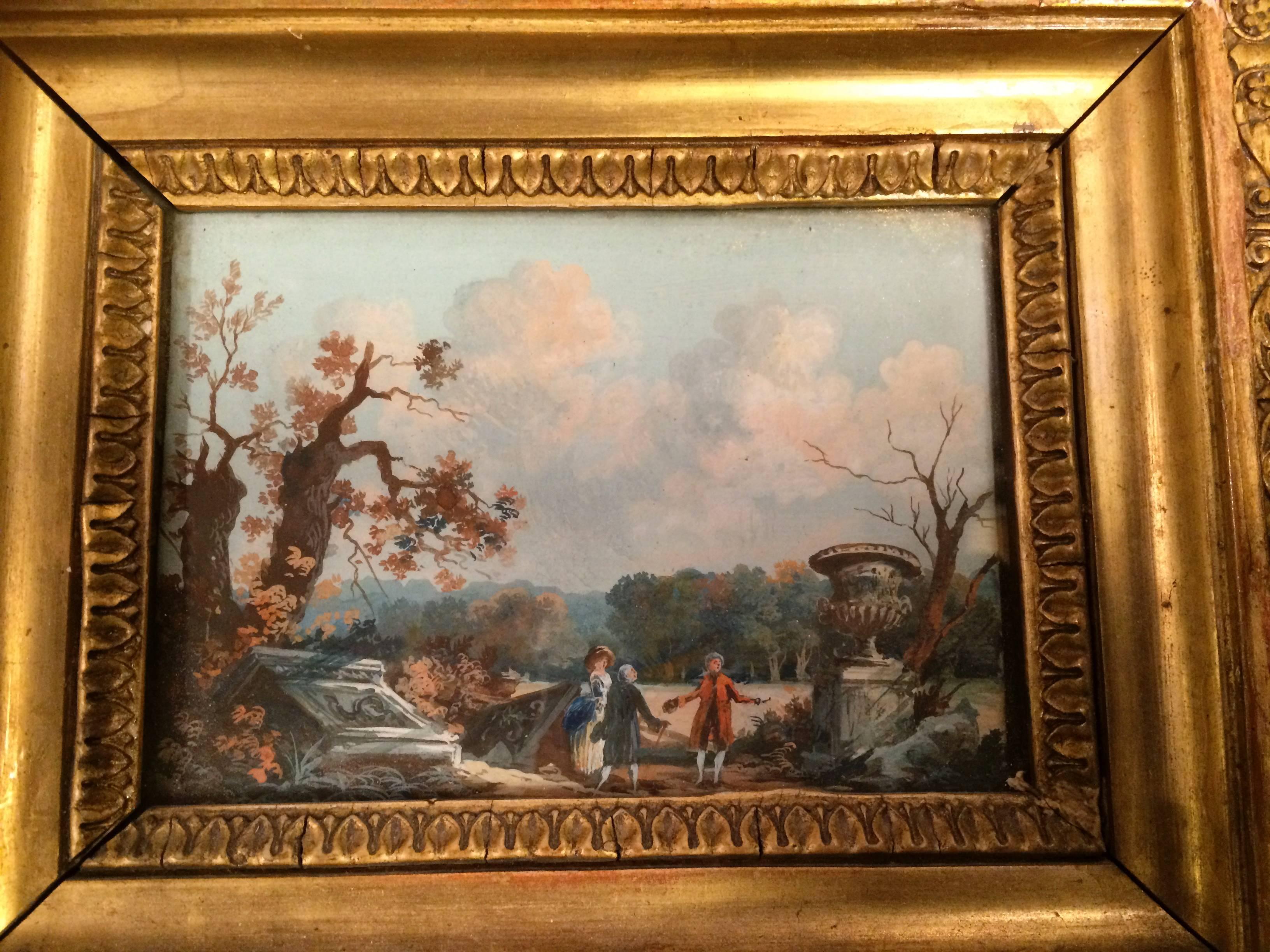 Neoclassical miniature gouache depicting figures on the 'Grand Tour' viewing a large marble urn and other Roman era ruins in a beautifully rendered landscape. In a period giltwood frame.