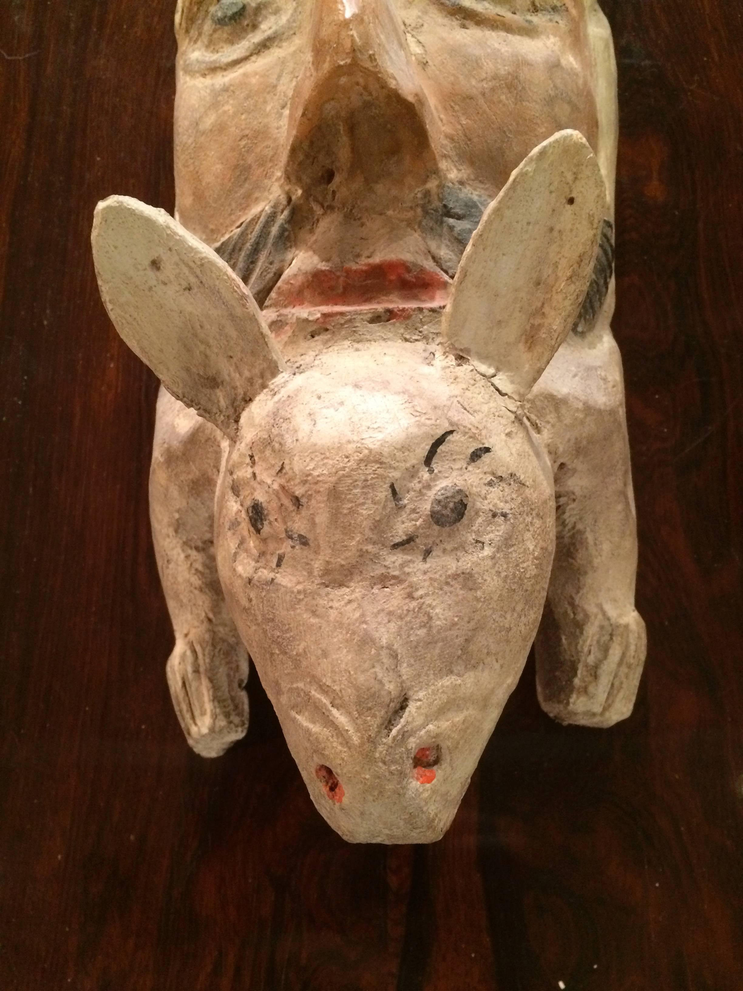 Wonderful vintage Mexican anthropomorphic Folk Art mask of a mans face on the back of a rabbit. Probably an early work by the master carver Juan Horta Castillo.
