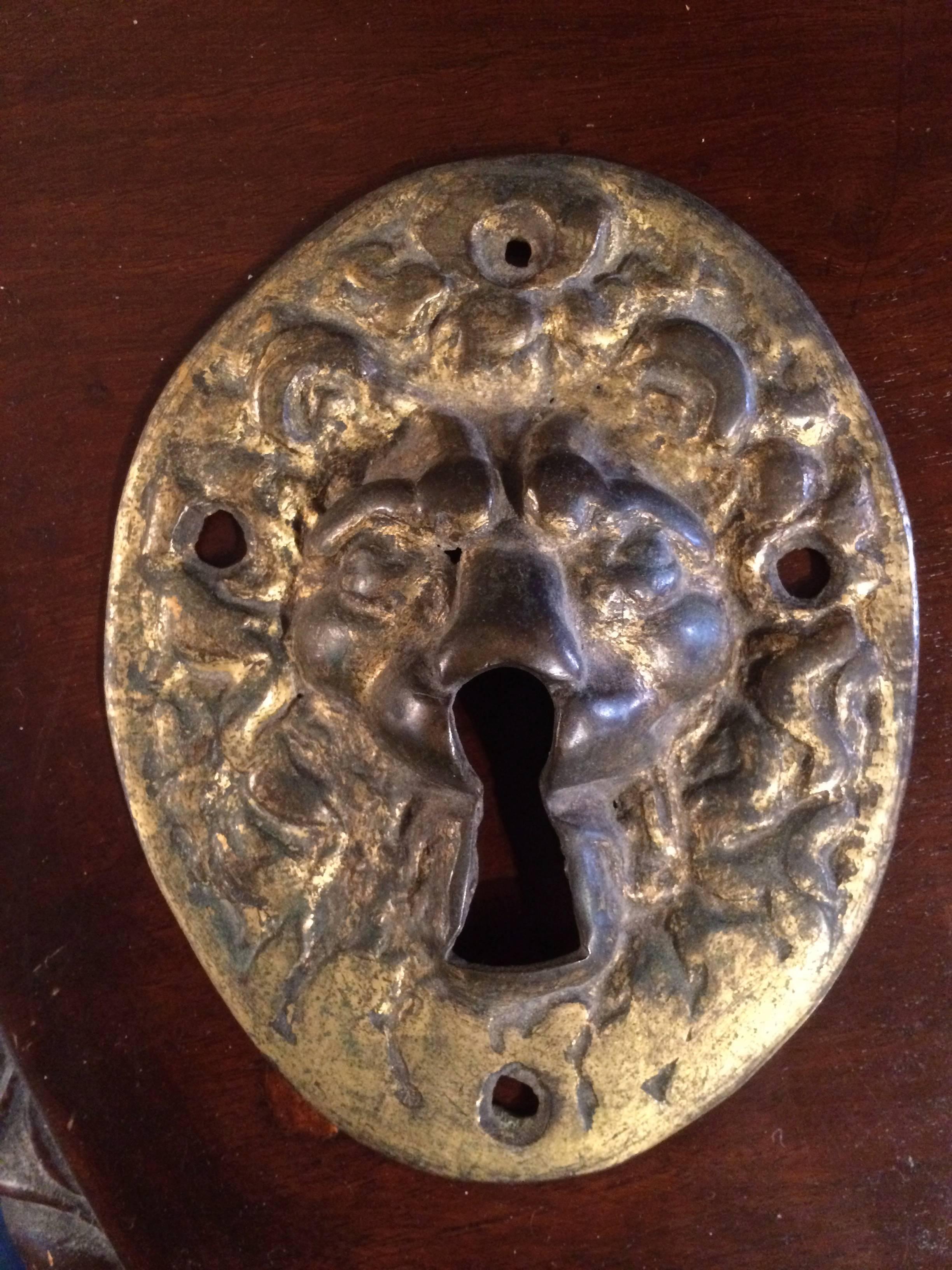 Interesting 18th century Italian gilt bronze escutcheon in the form of a lion.