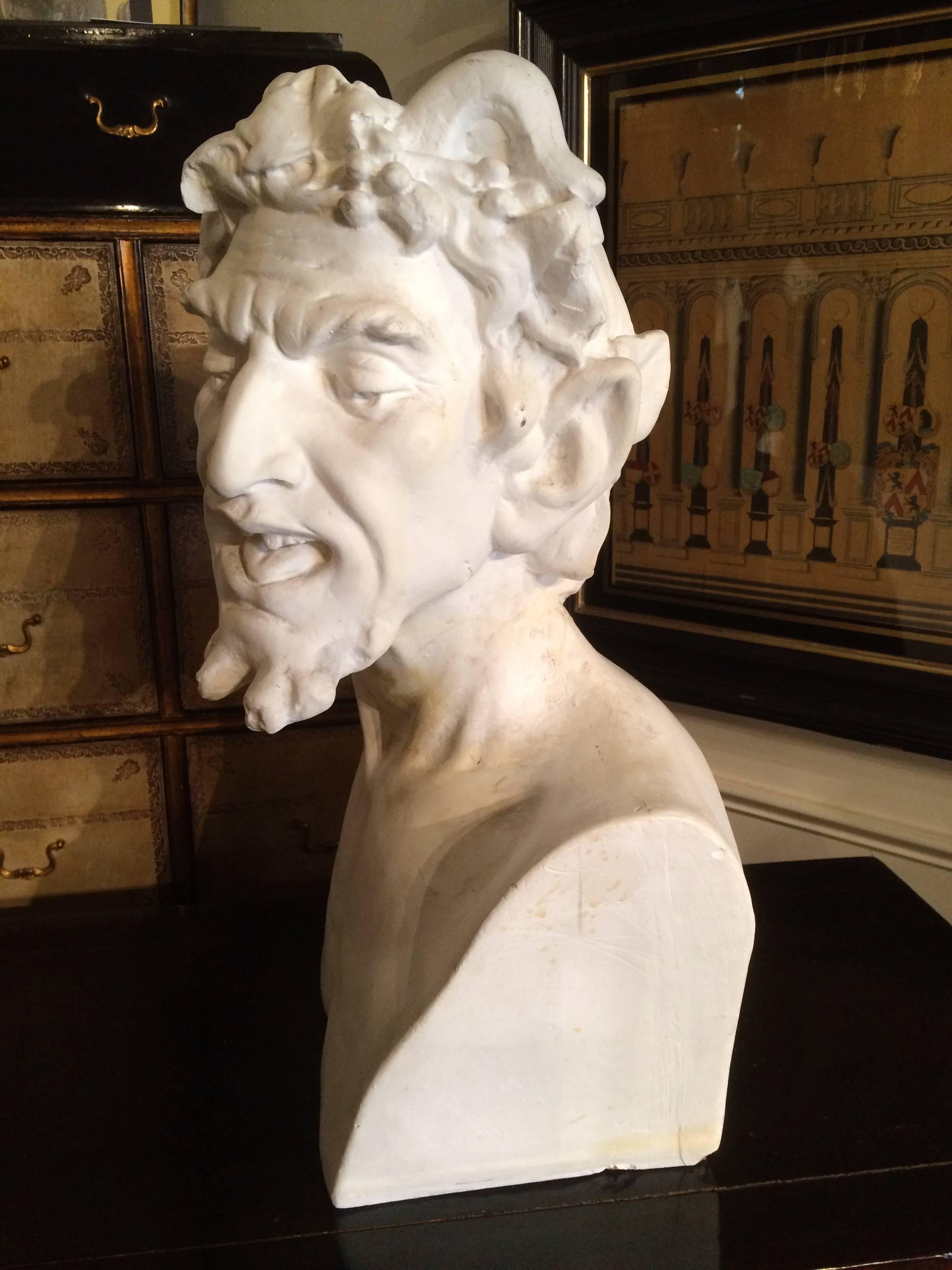 Vintage Italian plaster bust of Pan, after a Roman marble original. 
Pan is a figure from Greek mythology who was originally a pastoral god from Arcadia. He was believed to dwell in the mountains and forests of Greece and was considered the patron