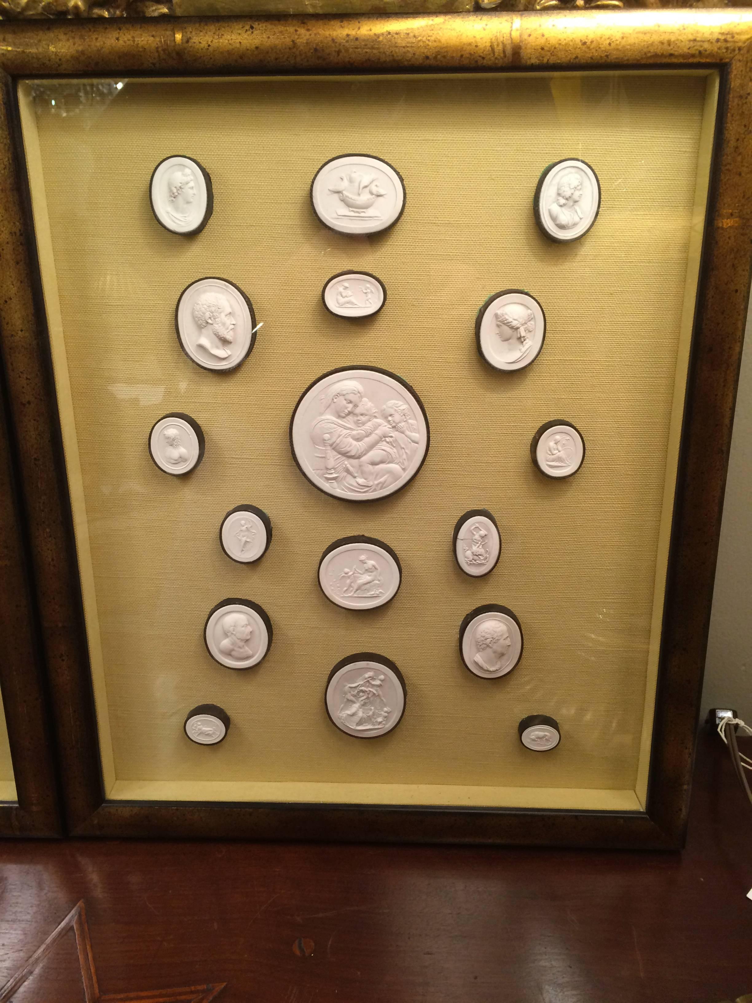 Set of 17 Italian 'Grand Tour' plaster intaglios depicting various famous works of art and antiquities. Mounted on pale gold silk in a gilt wood frame, circa 1820.

Can be purchased with the following item as a pair.

Made in Rome by Pietro