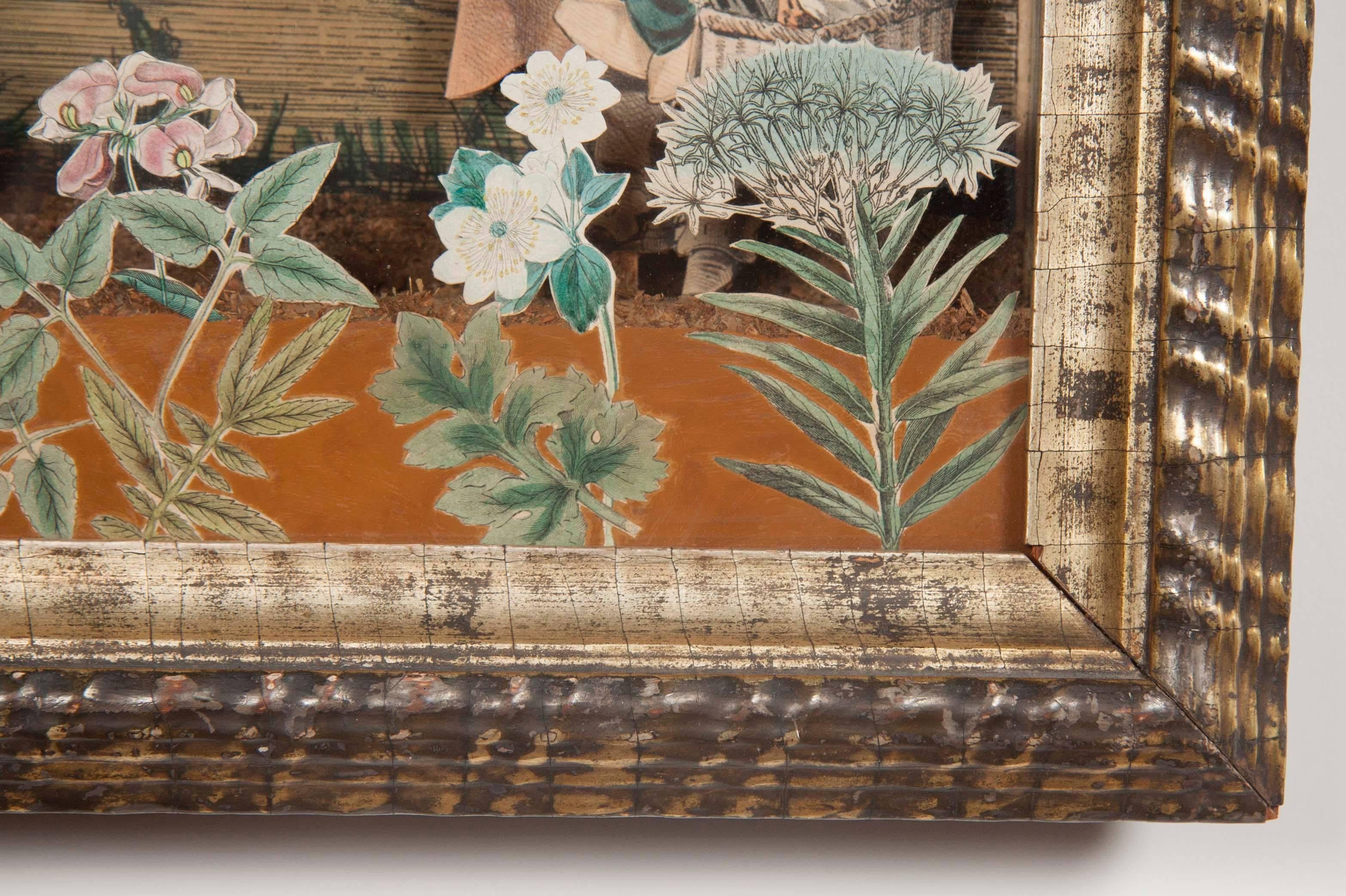 Charmantes französisches Diorama aus dem 18. Jahrhundert mit handkoloriertem Kupferstich. In originaler Schattenbox mit blattvergoldetem Riffelrahmen. Rückseitig betitelt 