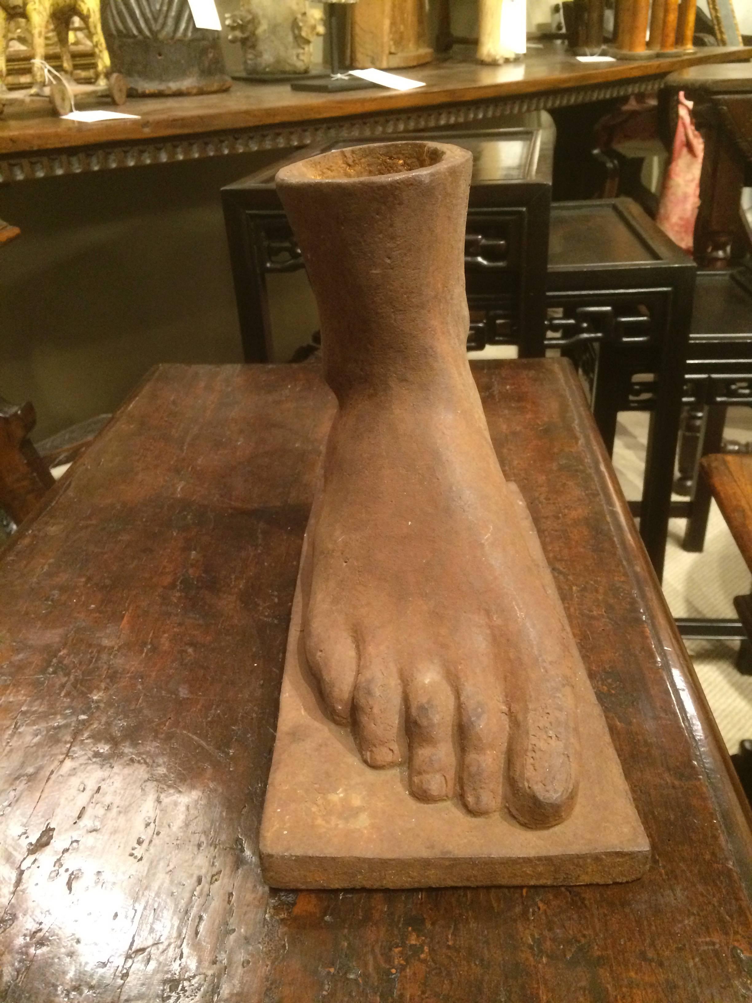 The perfect gift for the loved one with the foot fetish, or your cousin the reflexologist, or podiatrist, ... a cast iron right foot, American, circa 1920's. Will make a unique vase or pen holder too.