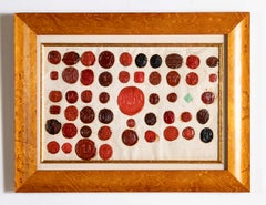 Conjunto de 4 entallados para sellos de cera rojos enmarcados, del norte de Europa, siglos XVIII-XIX