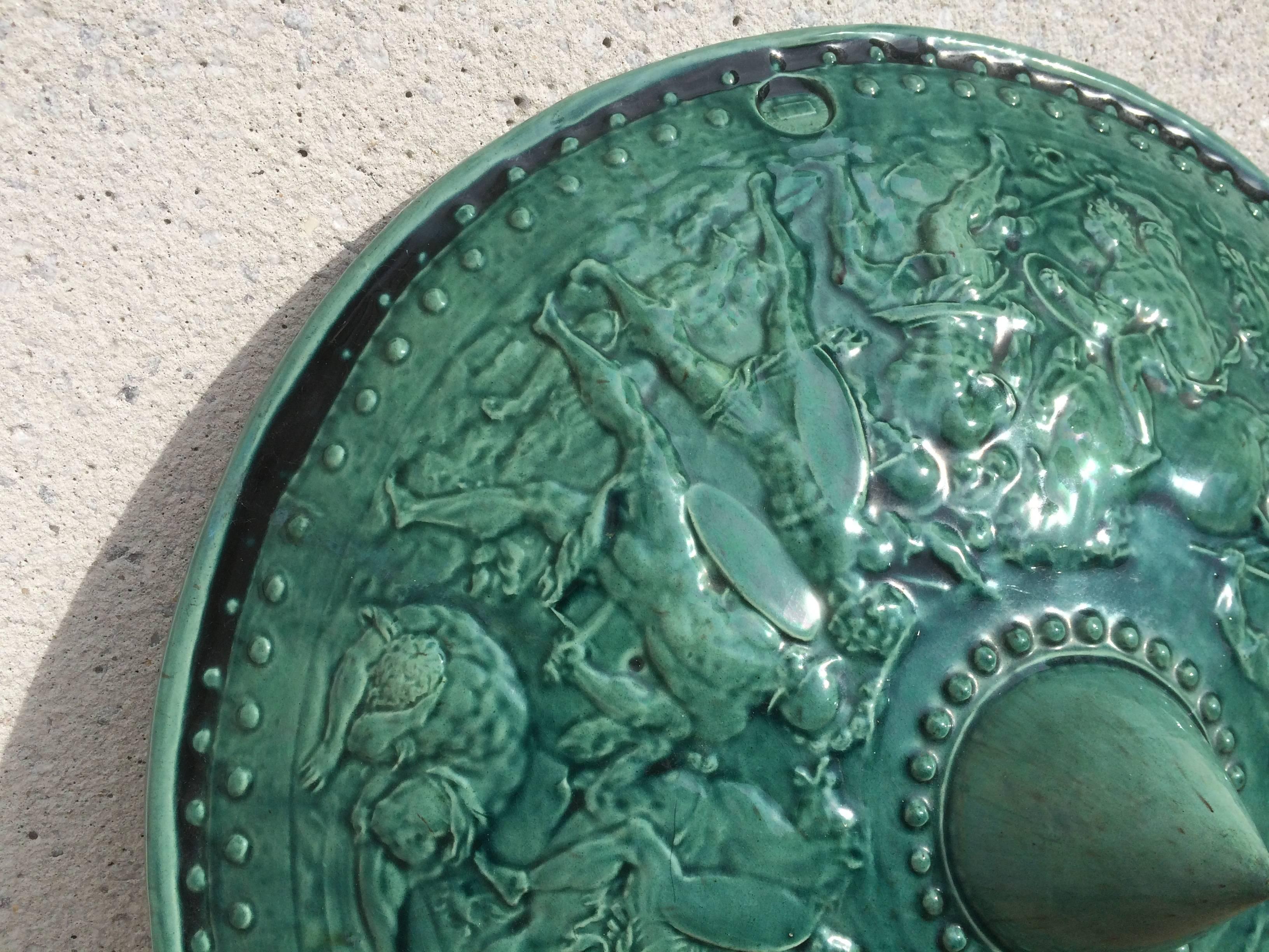 Pair of Turquoise Majolica Parade Shields with Battle Scenes, 19th Century In Excellent Condition In Stamford, CT