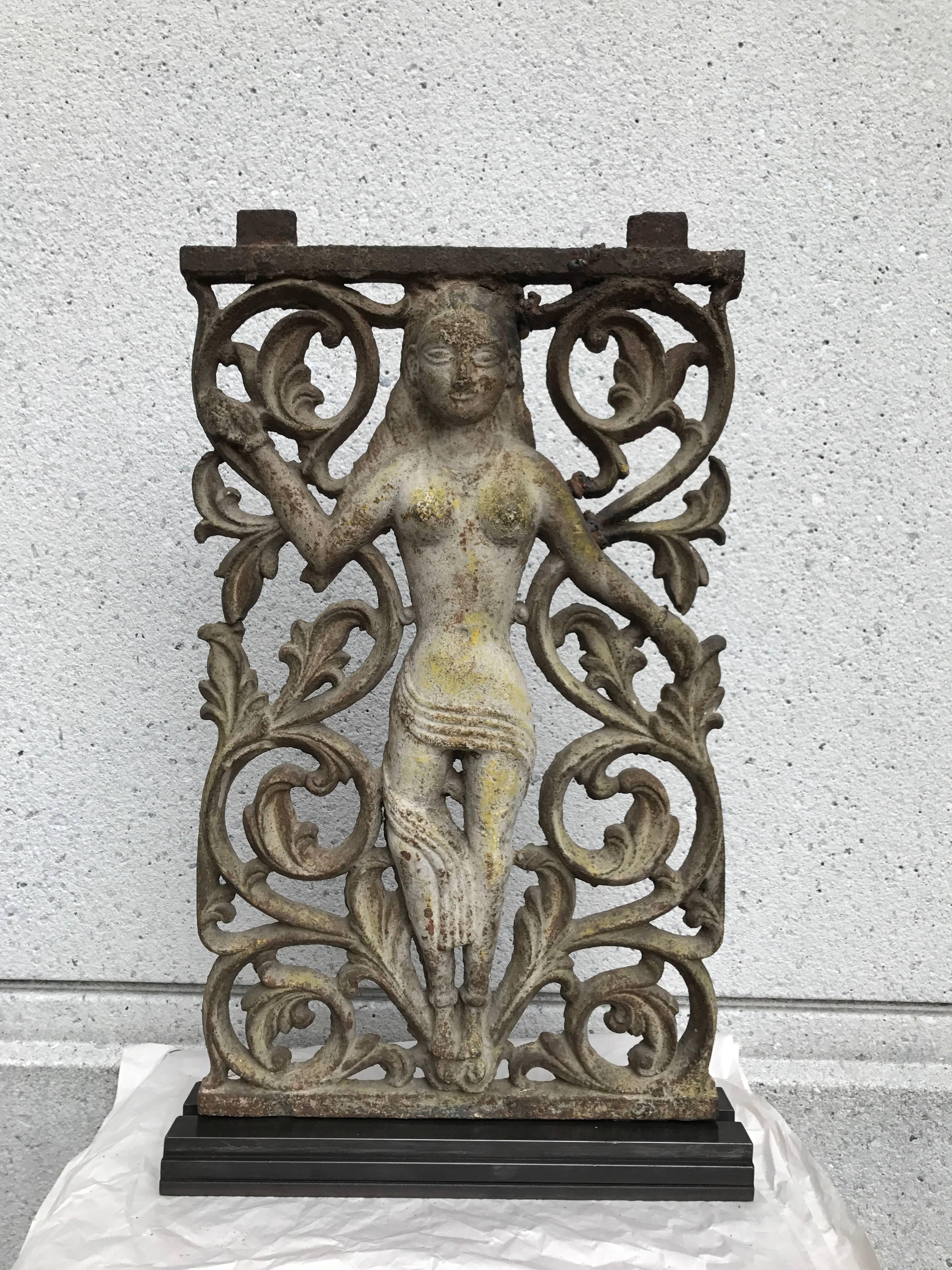 Pair of Anglo-Indian cast iron architectural panels now mounted in iron bases. Depicting a Hindu Goddess standing against a floral background. The panels can be removed from the bases. Traces of original paint.

Can be sold individually $1800 each.