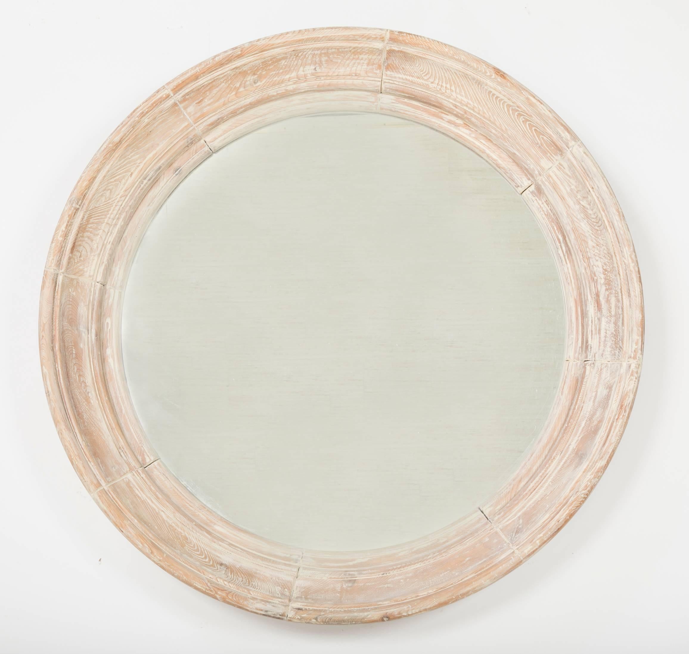 French Mid Century large scale cerused pine mirror in deep round frame. This mirror has great scale,  measuring 40 inches diameter by 4.5 deep. 