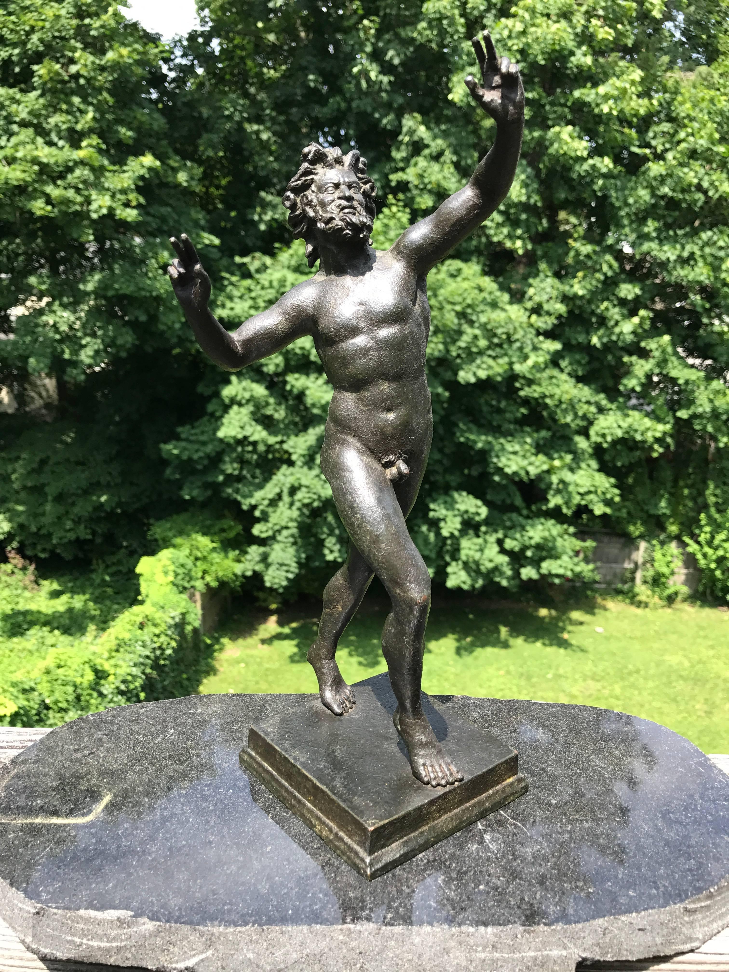 Beautiful Grand Tour bronze of 'The Dancing Faun', the Roman original excavated at Pompeii in 1830. Rich deep green patina.