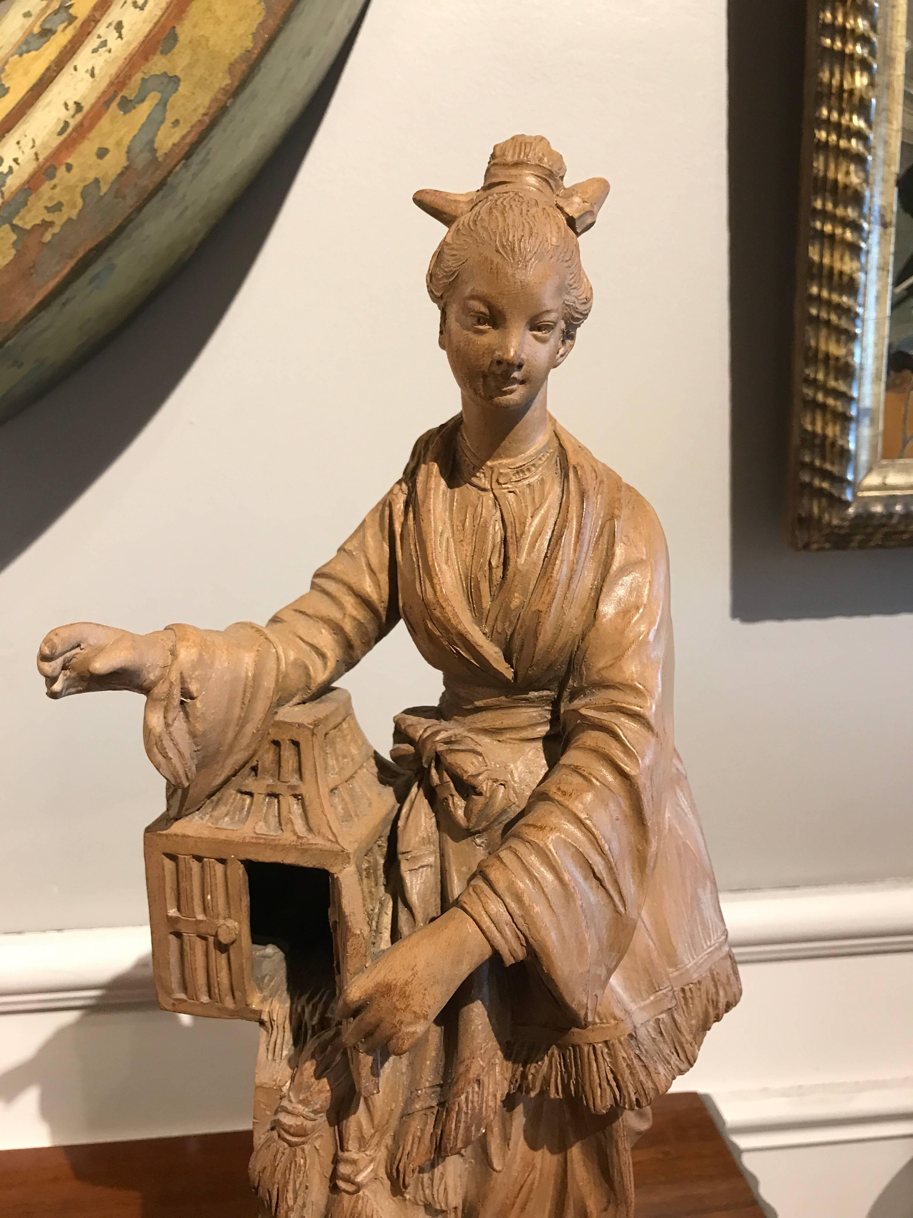 Pair of French Chinoiserie Terracotta Figures of Bird Sellers In Excellent Condition In Stamford, CT