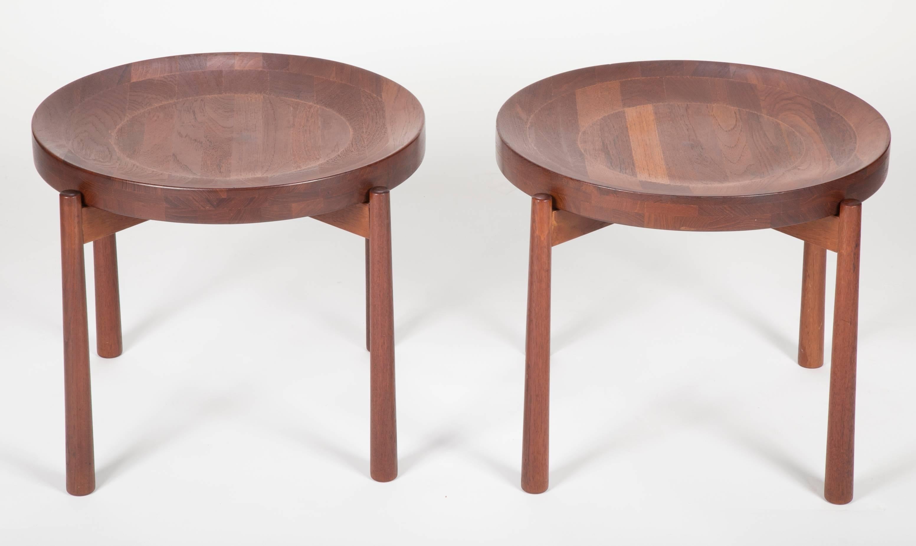 Estate fresh pair of teak flip-top side tables designed in the style of Danish designer Jens Quistgaard for DUX, Sweden, circa 1965. The solid teak tops are concave on one side and flat on the other.

Jens Harald Quistgaard (April 23, 1919 – January