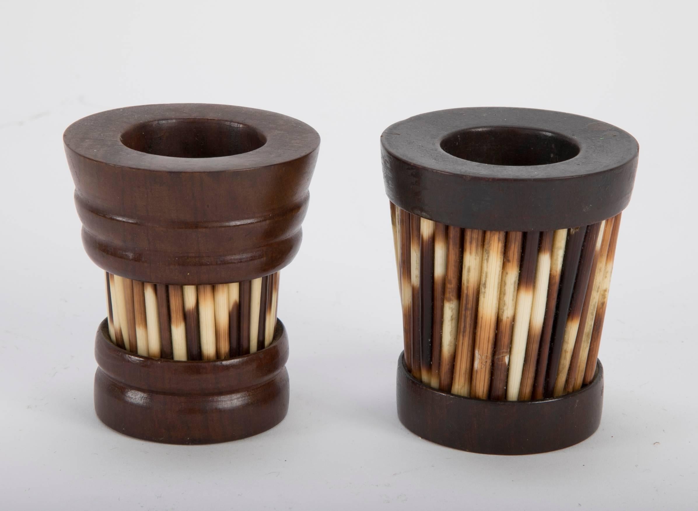 Two rare Anglo Indian porcupine quill and mahogany match holders. Made in colonial Ceylon, present day Sri Lanka. 

Part of a group of seven quill items we recently acquired, the group includes three boxes a basket a frame and two match holders.