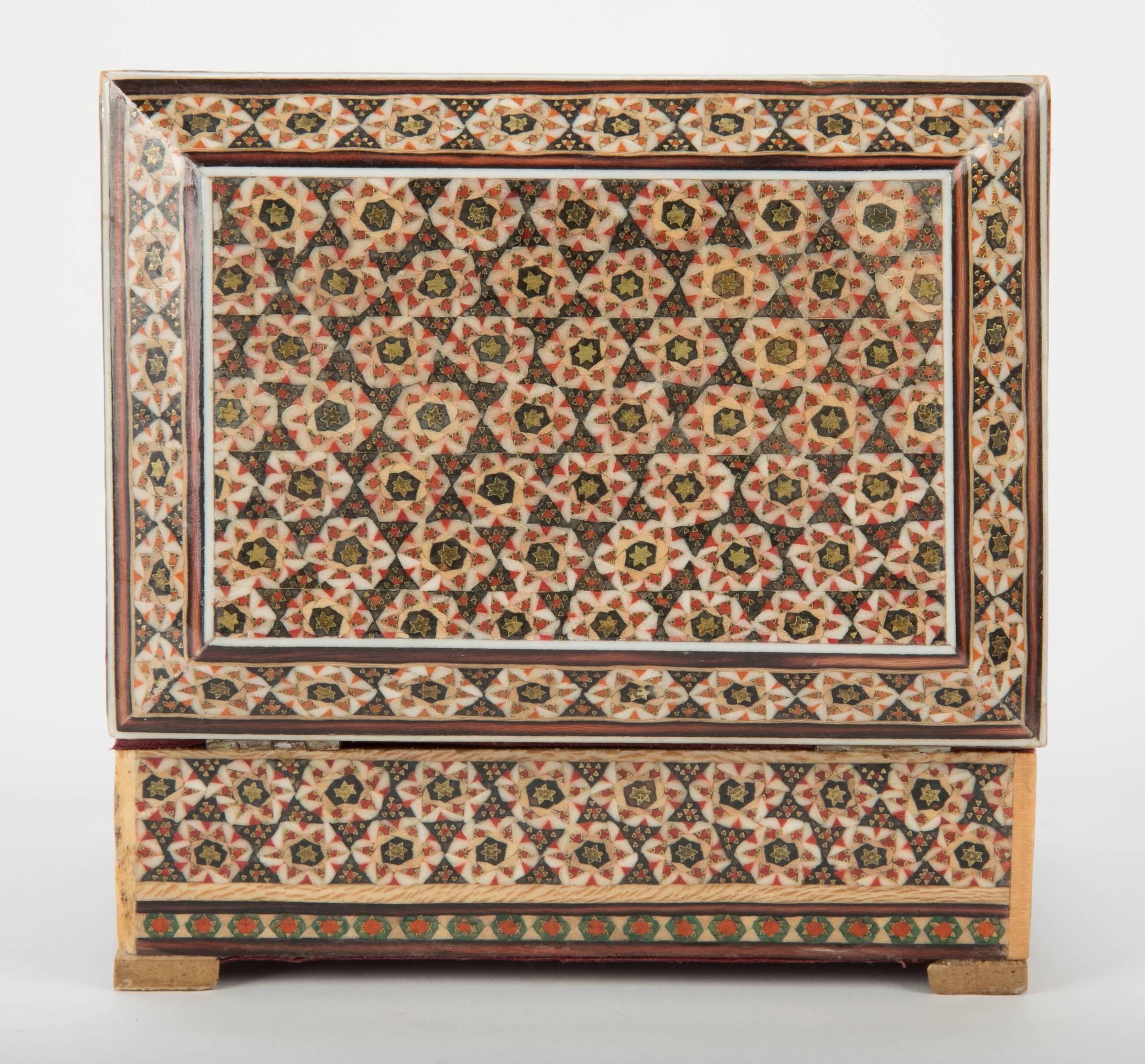 Persian box with intricate tessellated polished bone, rosewood and colored wood design covering the entire surface, the workmanship that goes into one of these boxes is stunning. All handmade.