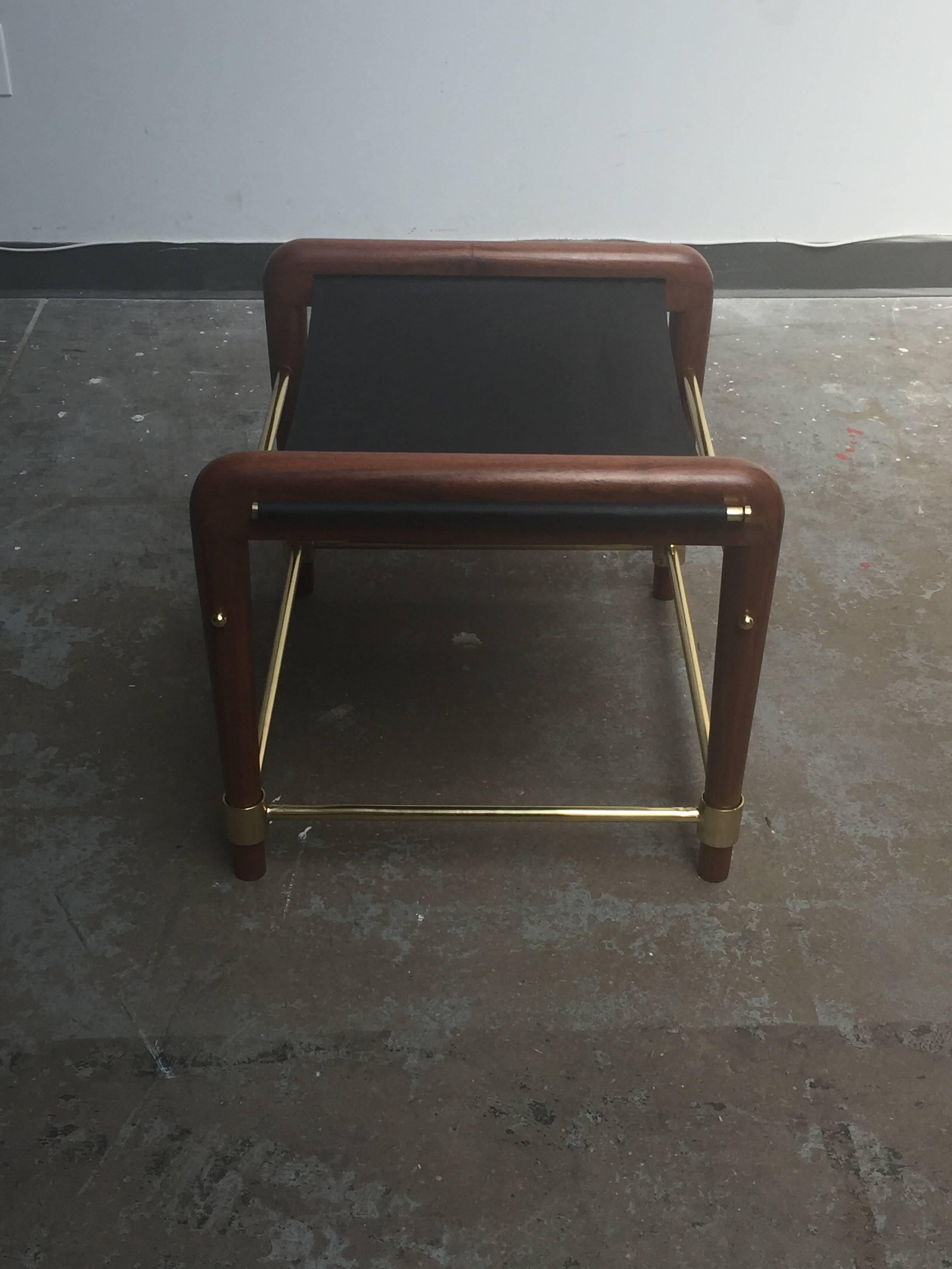 Solid natural Tzalam wood, brass frame and black leather seat.