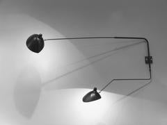 Serge Mouille Rotating Sconce Two Arms, One Curved