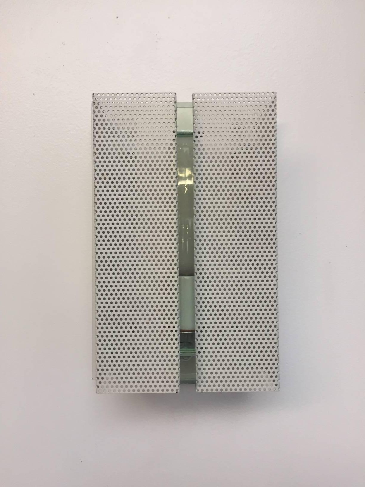 Wall sconce with perforated metal. Four available.