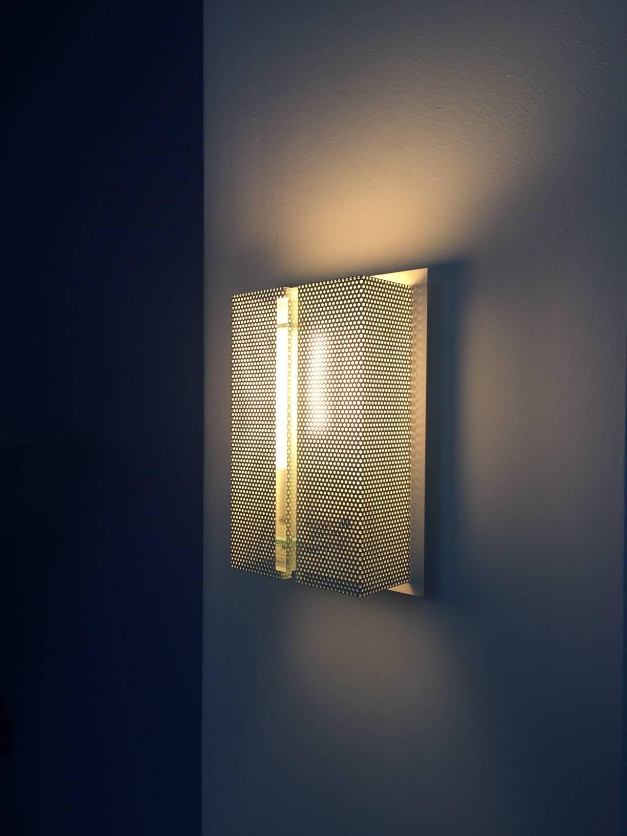 perforated metal wall sconce