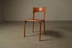 Set of five Italian dining chairs in cognac leather, 1990s