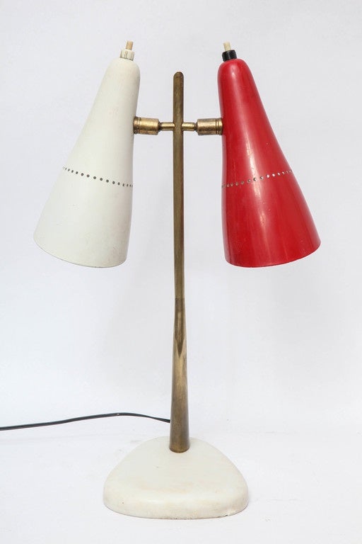 A 1950s Italian articulated table lamp by Lumen.
