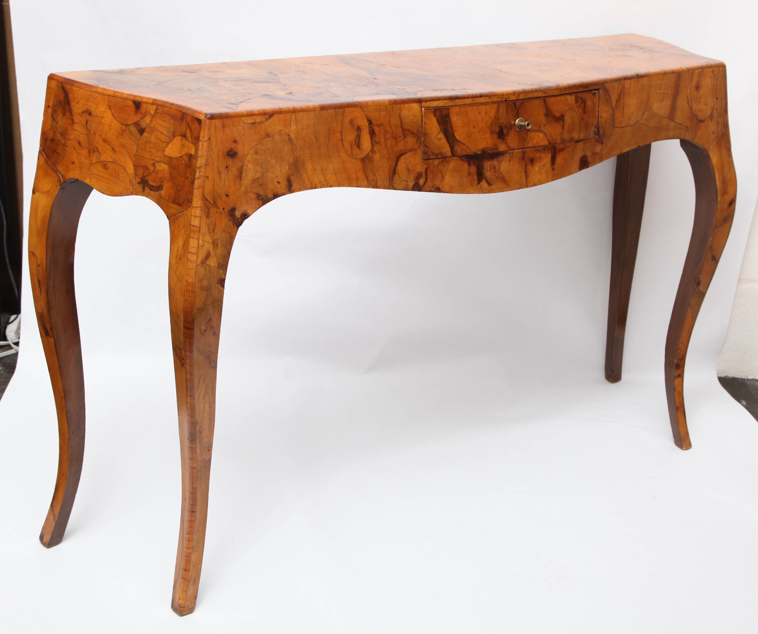 A 1940's Italian Art Moderne exotic burled wood Console/Desk