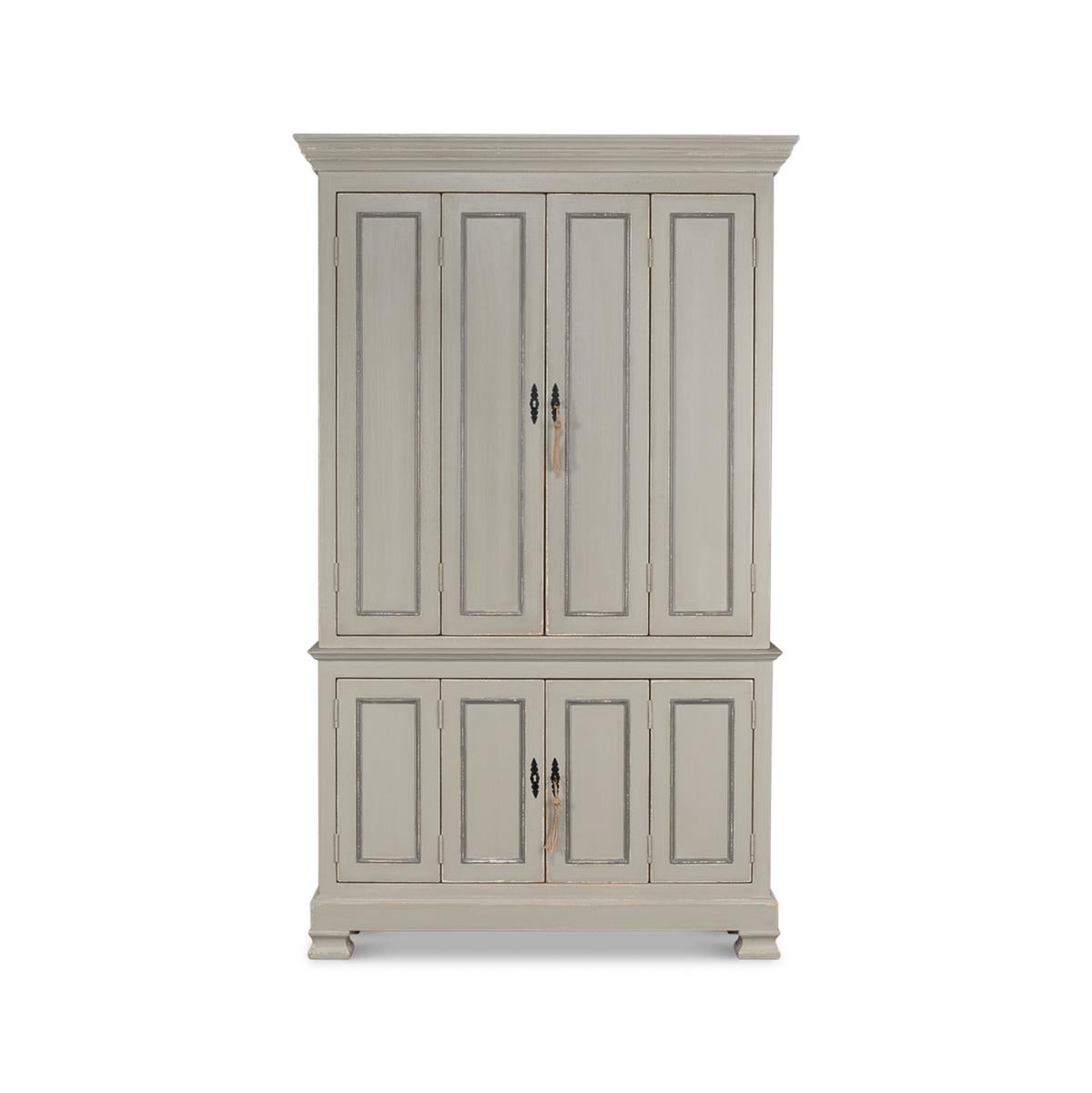 A North European provincial painted cabinet in an antique 18th century style with a distressed grey painted finish. A cabinet of grand size and scale, amply large with plentiful space for display or storage. This cabinet is crafted from