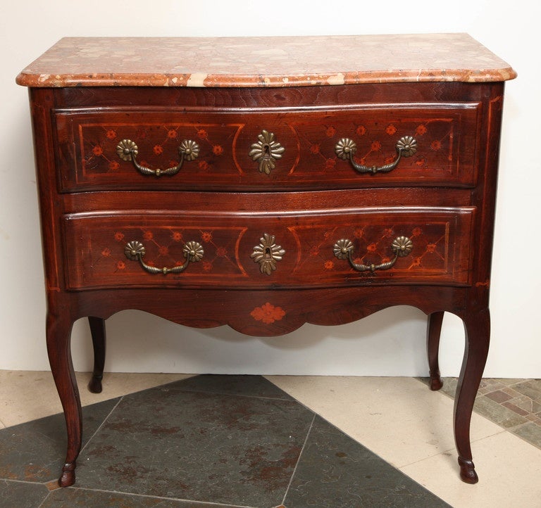 Continental Louis XV taste marble topped walnut two-drawer commode with trellis marquetry panelled drawers, serpentine apron and cabriole legs ending in hoof feet.