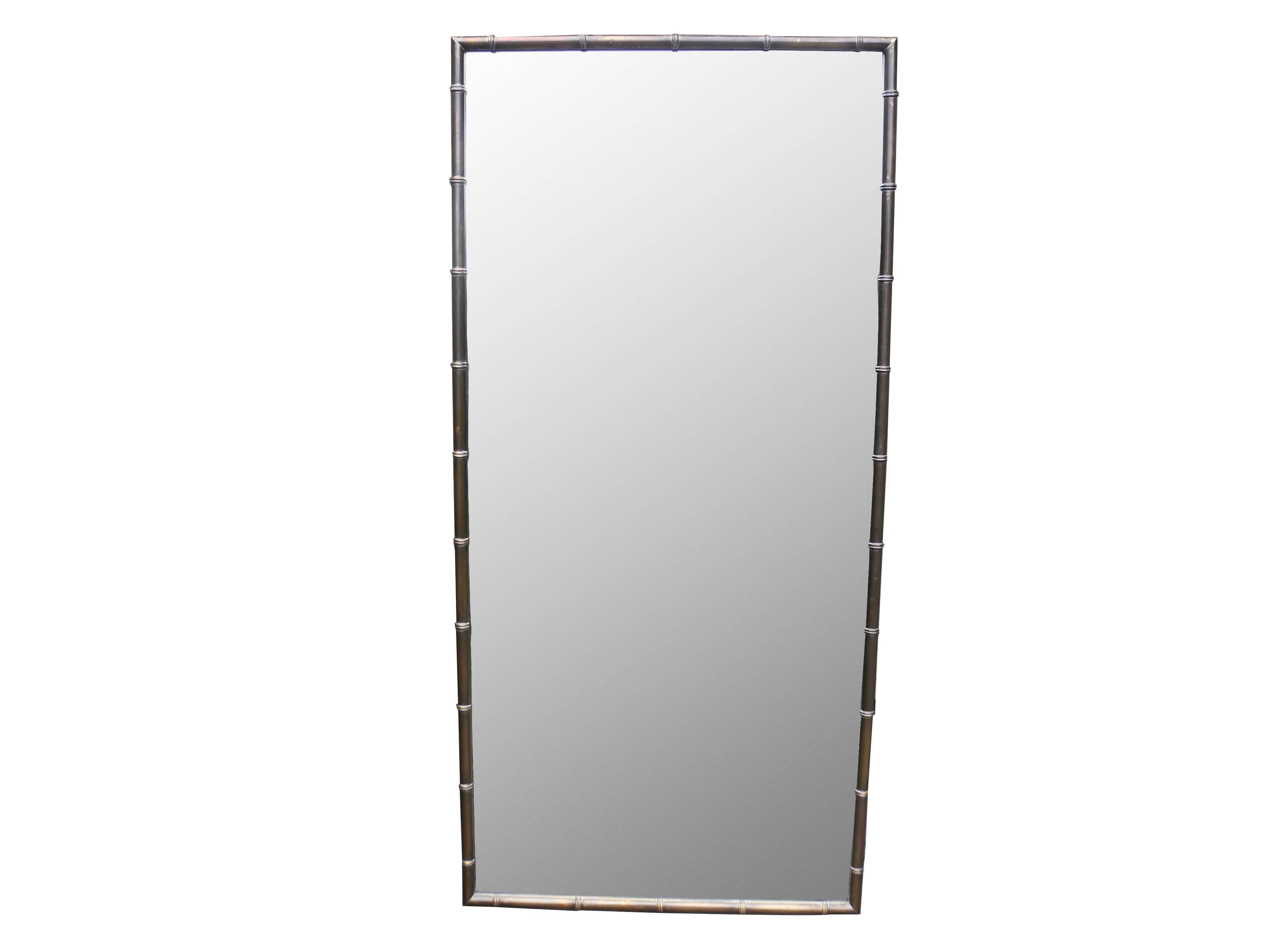 Solid brass faux bamboo mirror with excellent bronze patina.