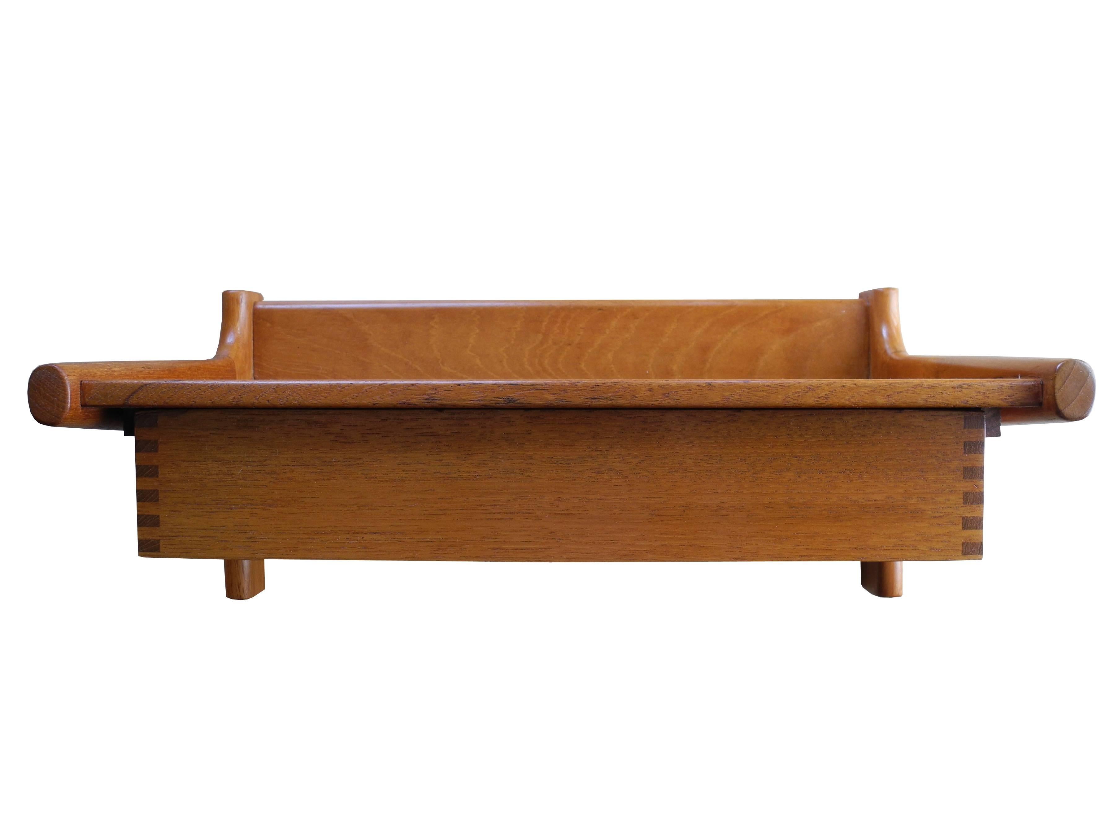 This made in Denmark, single drawer floating night shelf was designed by Børge Mogensen, 1960s.