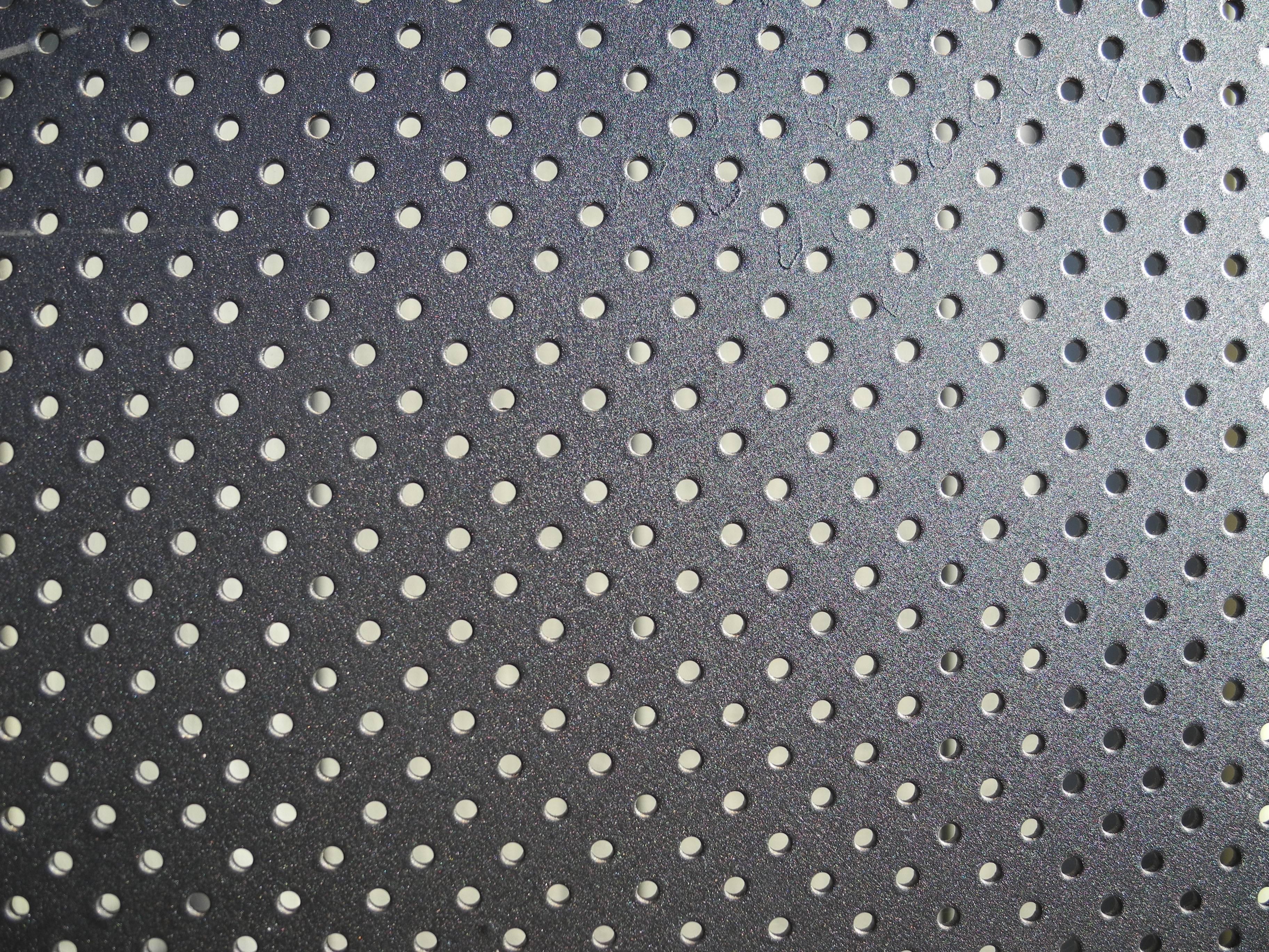 This perforated, black metal screen comes apart in three panels. Each panel is 66" tall by 19" wide.
  