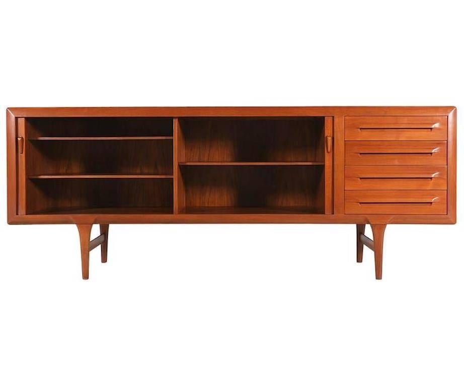 Midcentury large teak storage cabinet or credenza for the home or office by the Danish designer Ib Kofod-Larsen, Denmark, 1960.