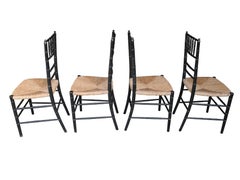 Set of Four Faux Bamboo Wood and Rush Decorative Chairs