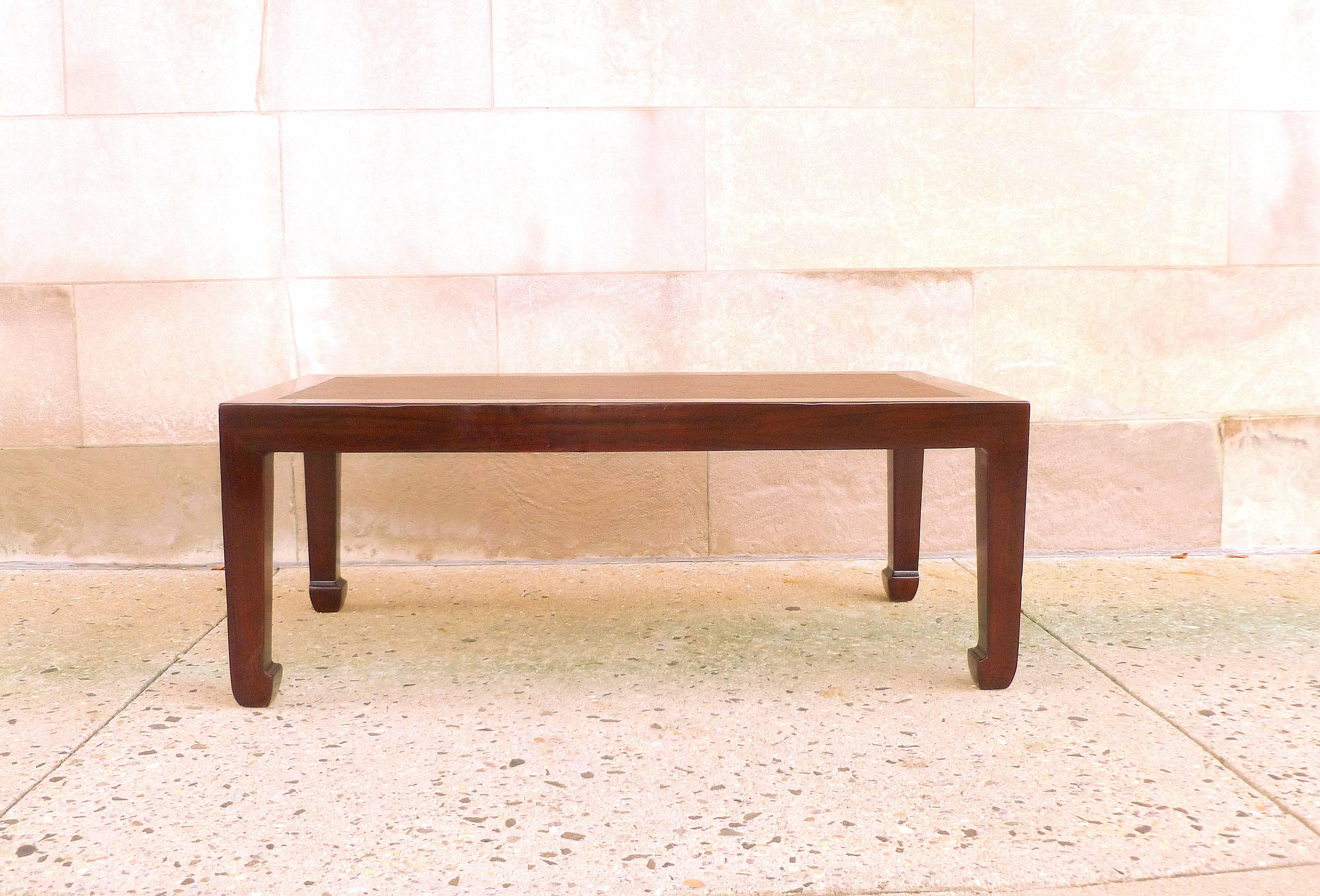 A simple and elegant rectangular low table, ju mu wood with framed cane top, beautiful color, form and texture.  We carry fine quality furniture with elegant finished and has been appeared many times in 