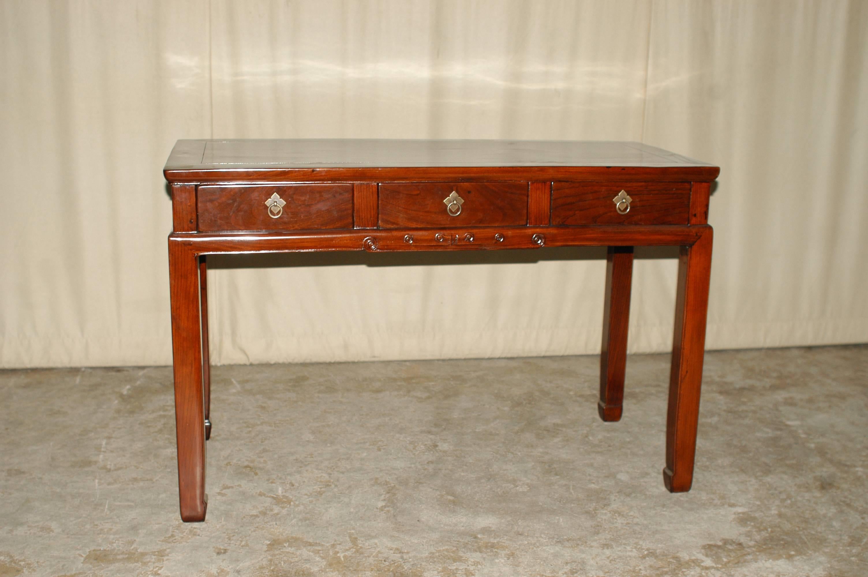 Fine Jumu table or desk with three drawers, brass ring pulls, beautiful form and lines.  We carry fine quality furniture with elegant finished and has been appeared many times in 
