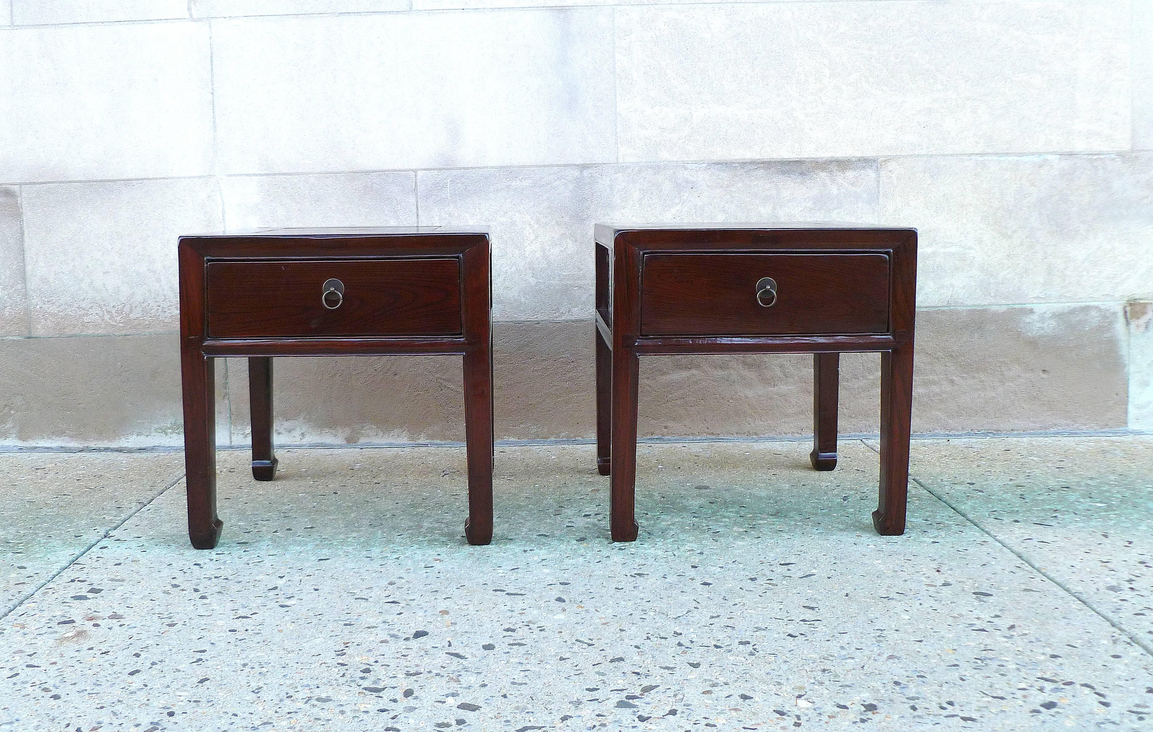 Fine Jumu end tables with drawers, each with open drawers and hoof feet.  We carry fine quality furniture with elegant finished and has been appeared many times in 