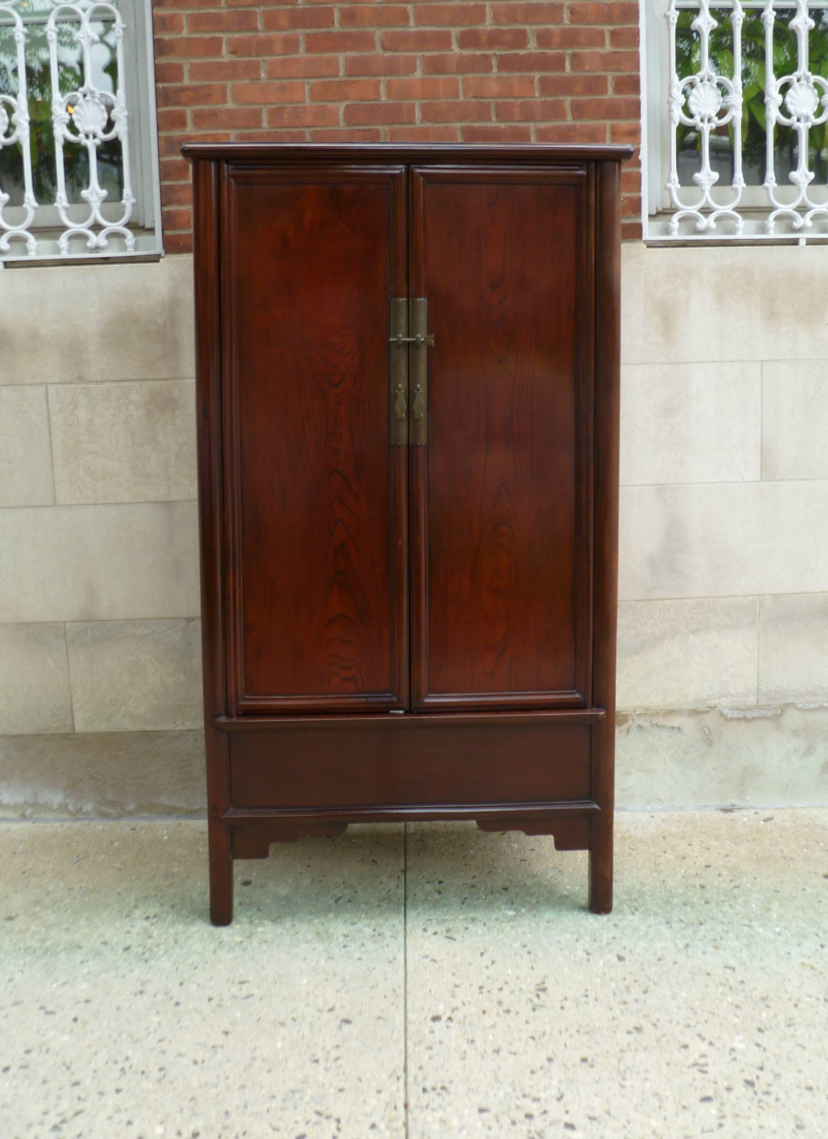 Fine Ju mu wood scholar's cabinet, beautiful wood grain and color, elegant form.  We carry fine quality furniture with elegant finished and has been appeared many times in 