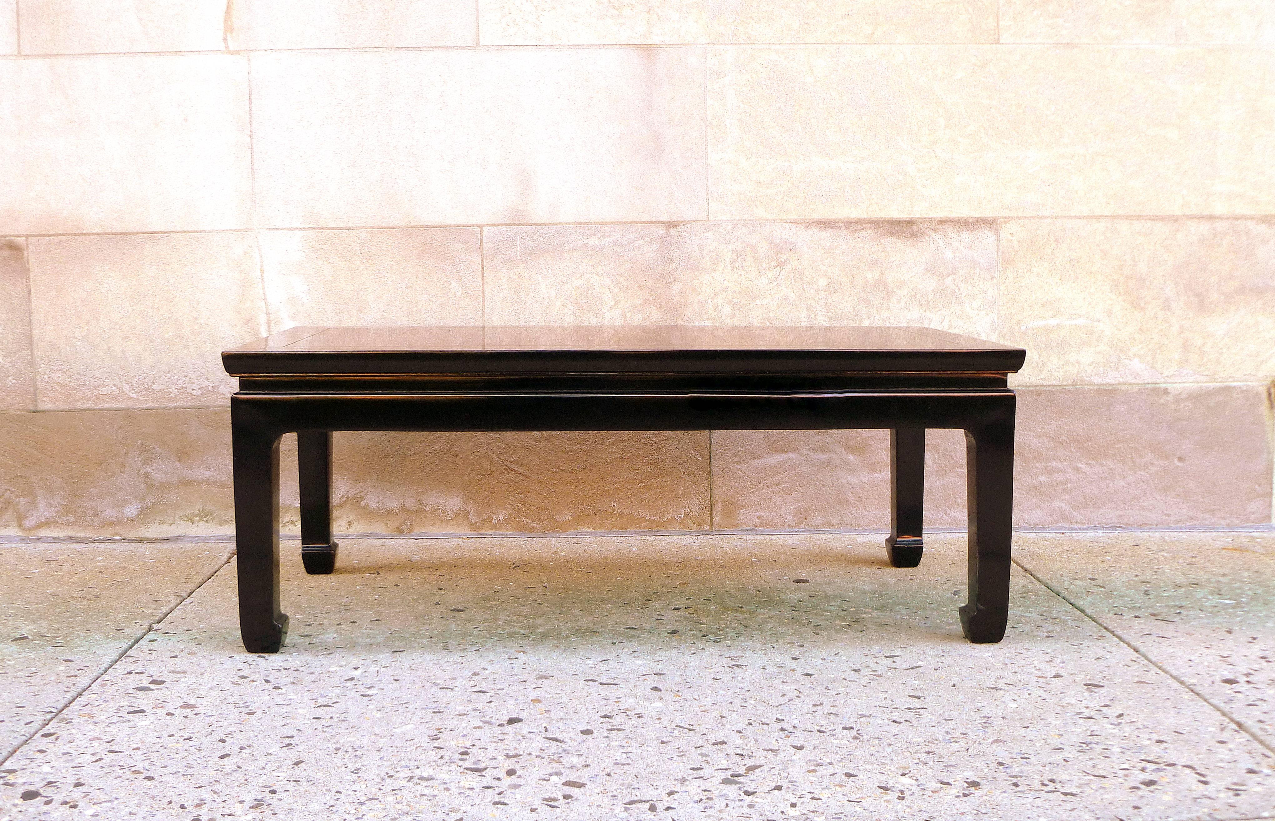 Simple and elegant black lacquer low table with straight legs.