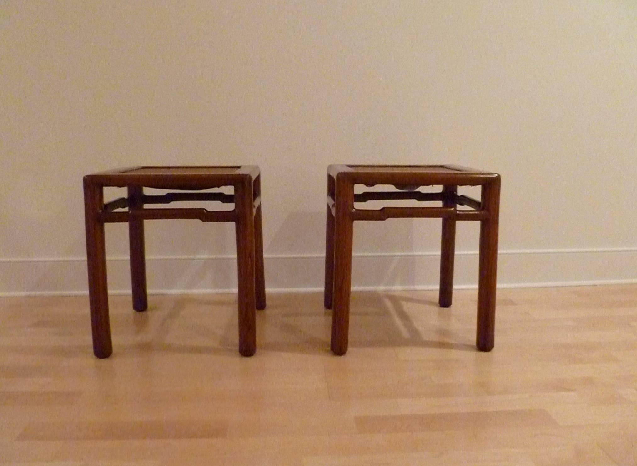 Pair of fine Jumu wood end tables with canned top. Elegant and simple form.
