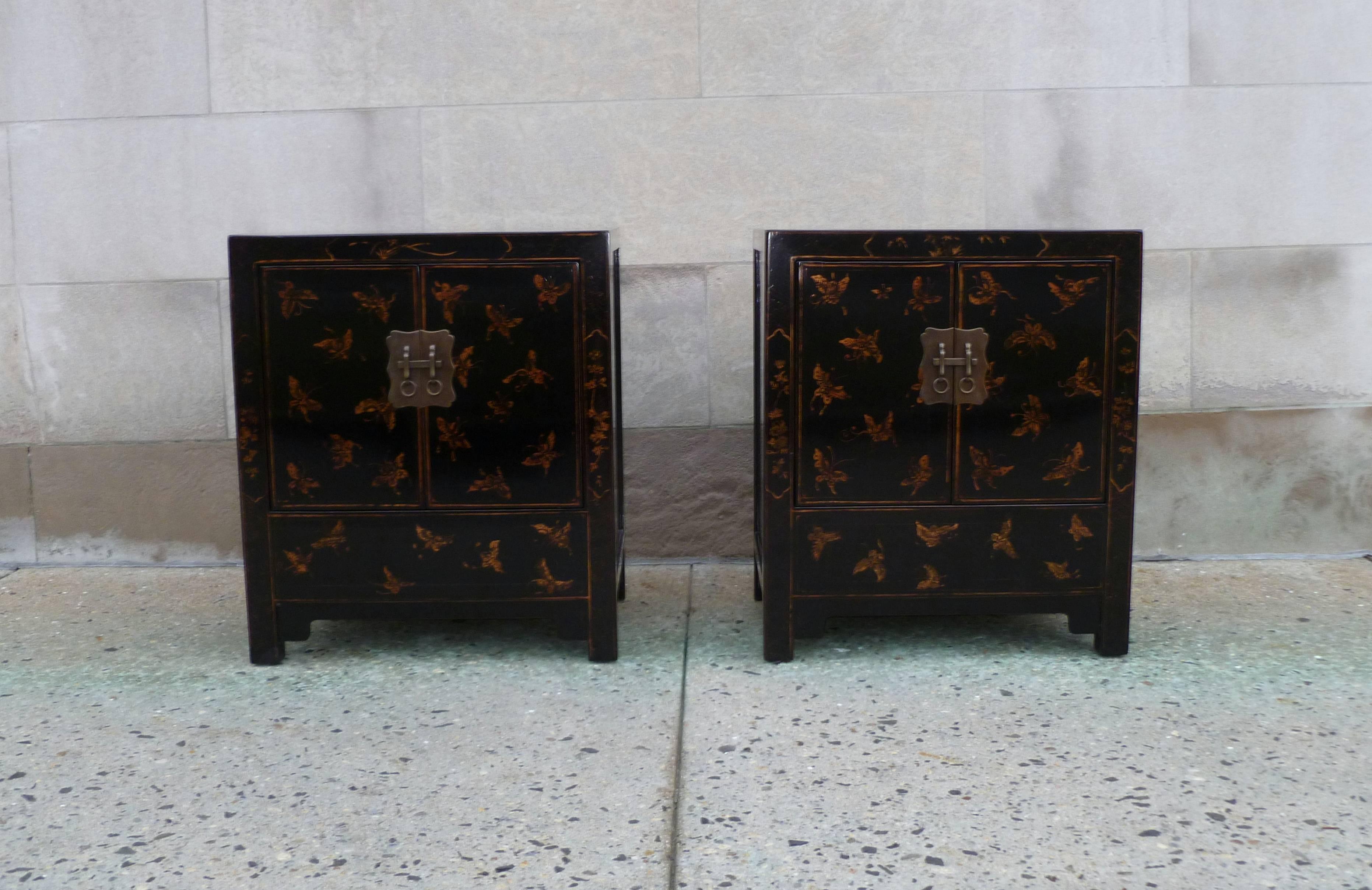 A pair of fine black lacquer chests with beautiful hand-painted butterfly motif in gold gilt.