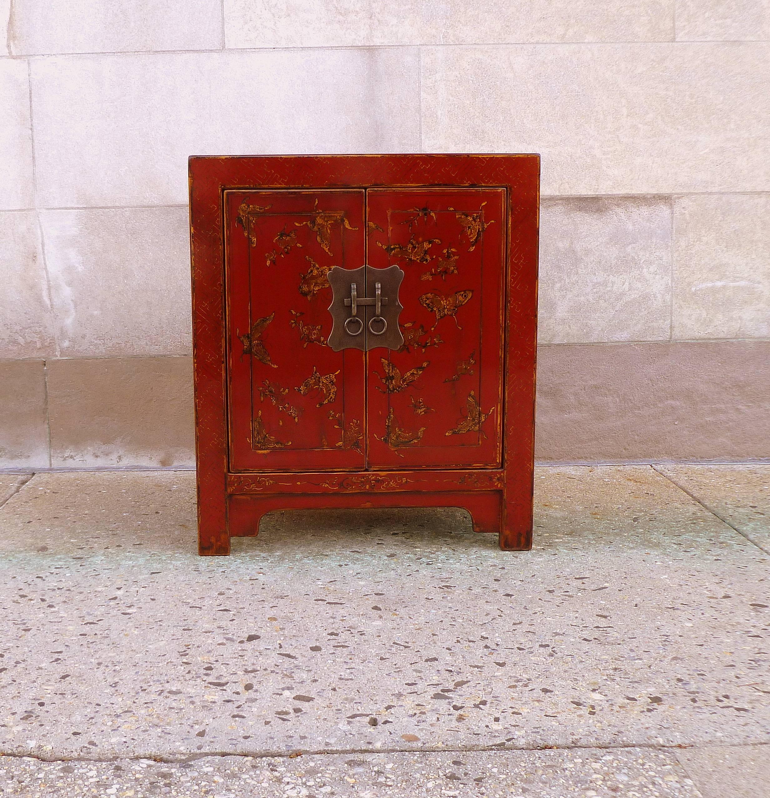 Fine red lacquer chest with gilt motif butterflies design. Elegant and beautiful color.