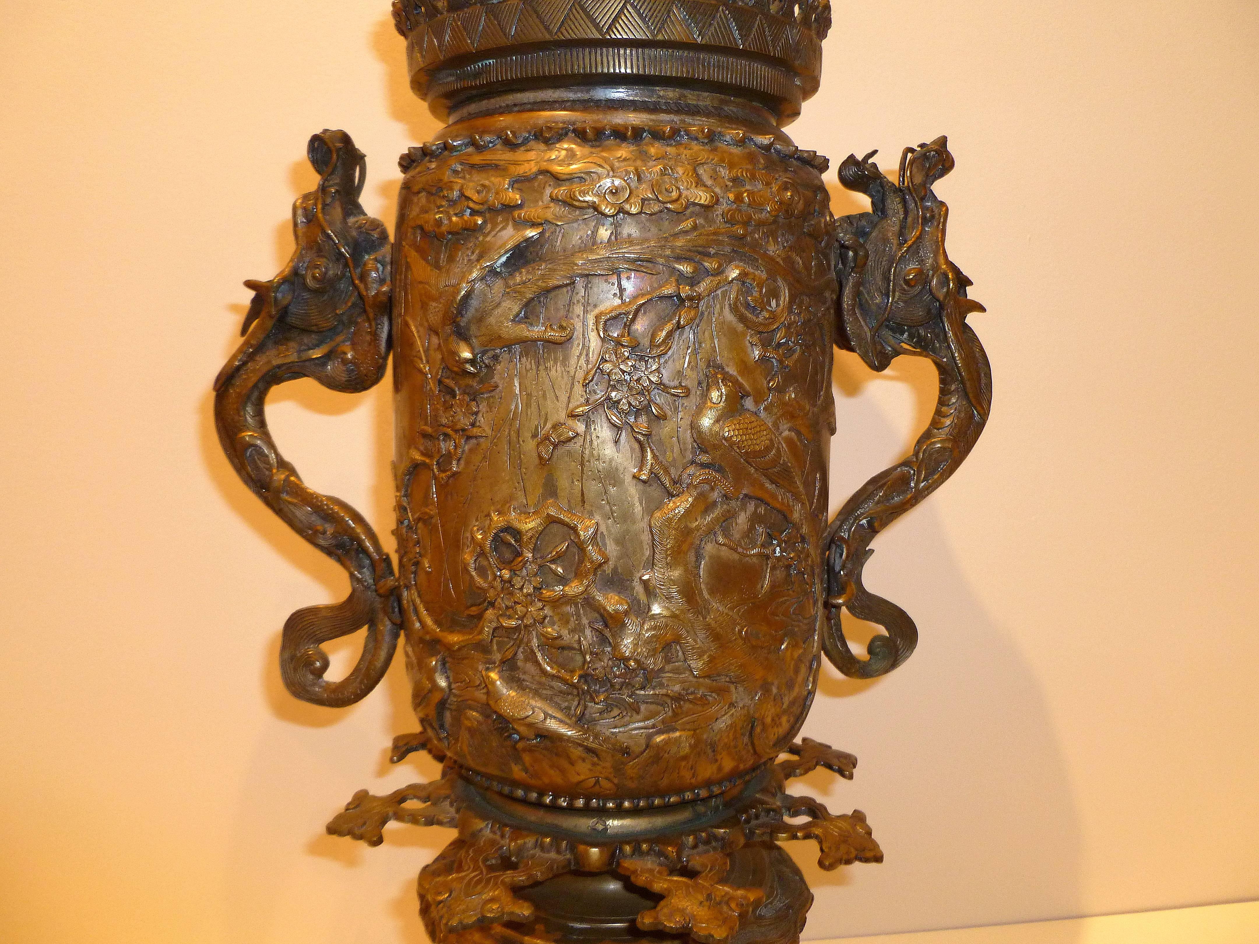 Late 19th Century Japanese Bronze Vessel with Dragon Handles and Falcon Lid For Sale