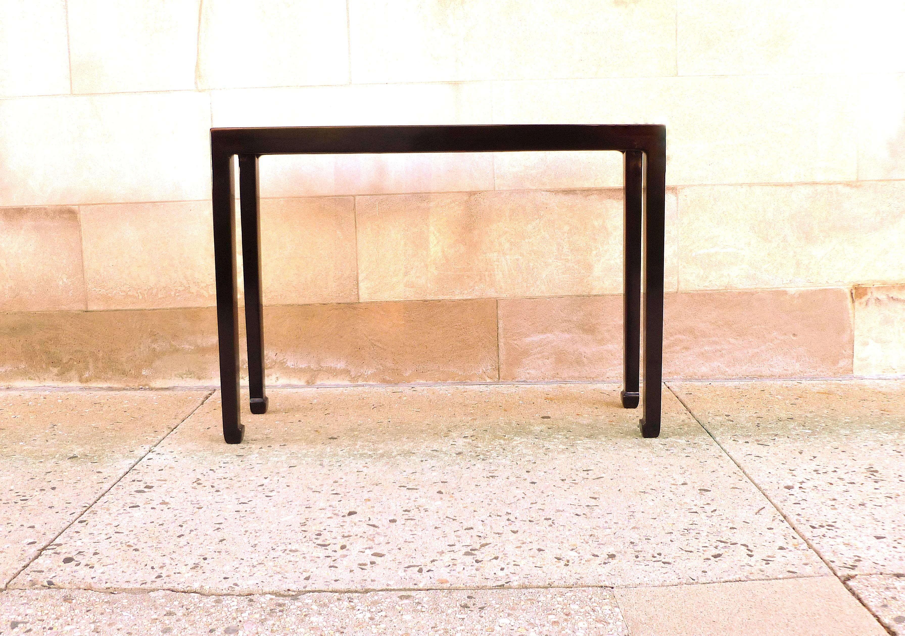 Fine black lacquer console table with straight legs. Simple and elegant form, beautiful color.