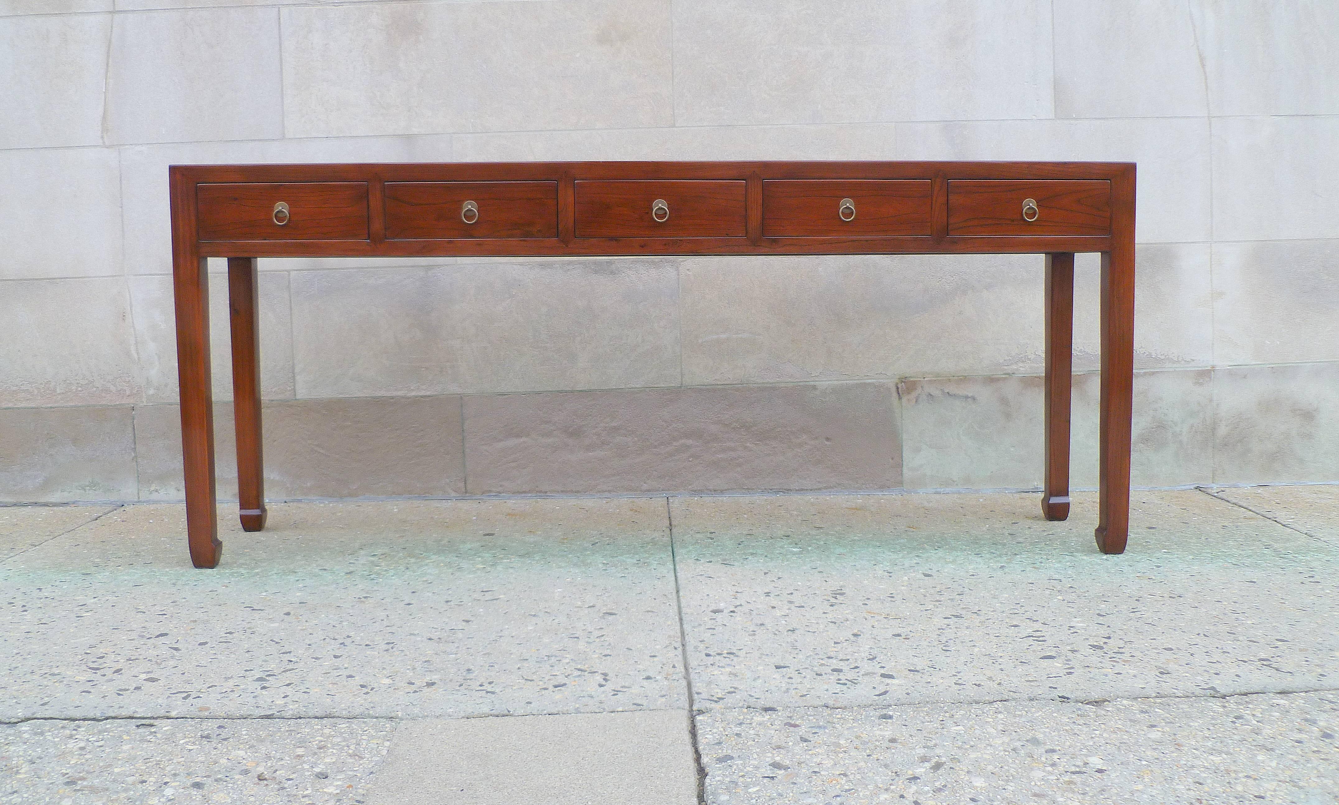 Fine Jumu wood console table with five drawers and brass fitting. Simple and elegant form.  We carry fine quality furniture with elegant finished and has been appeared many times in 