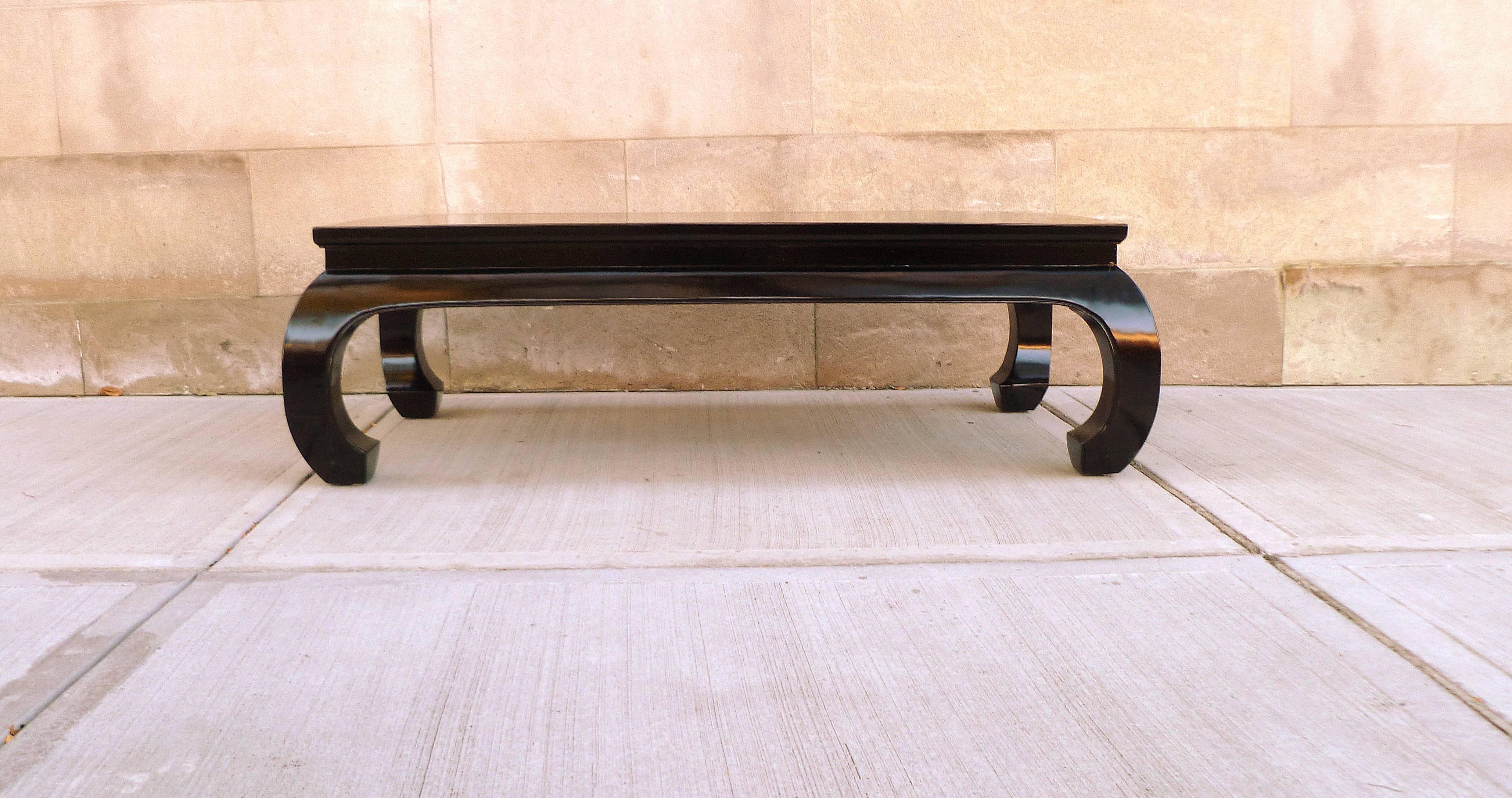 Fine black lacquer low table. Simple and elegant, beautiful color, lines and form.  We carry fine quality furniture with elegant finished and has been appeared many times in 