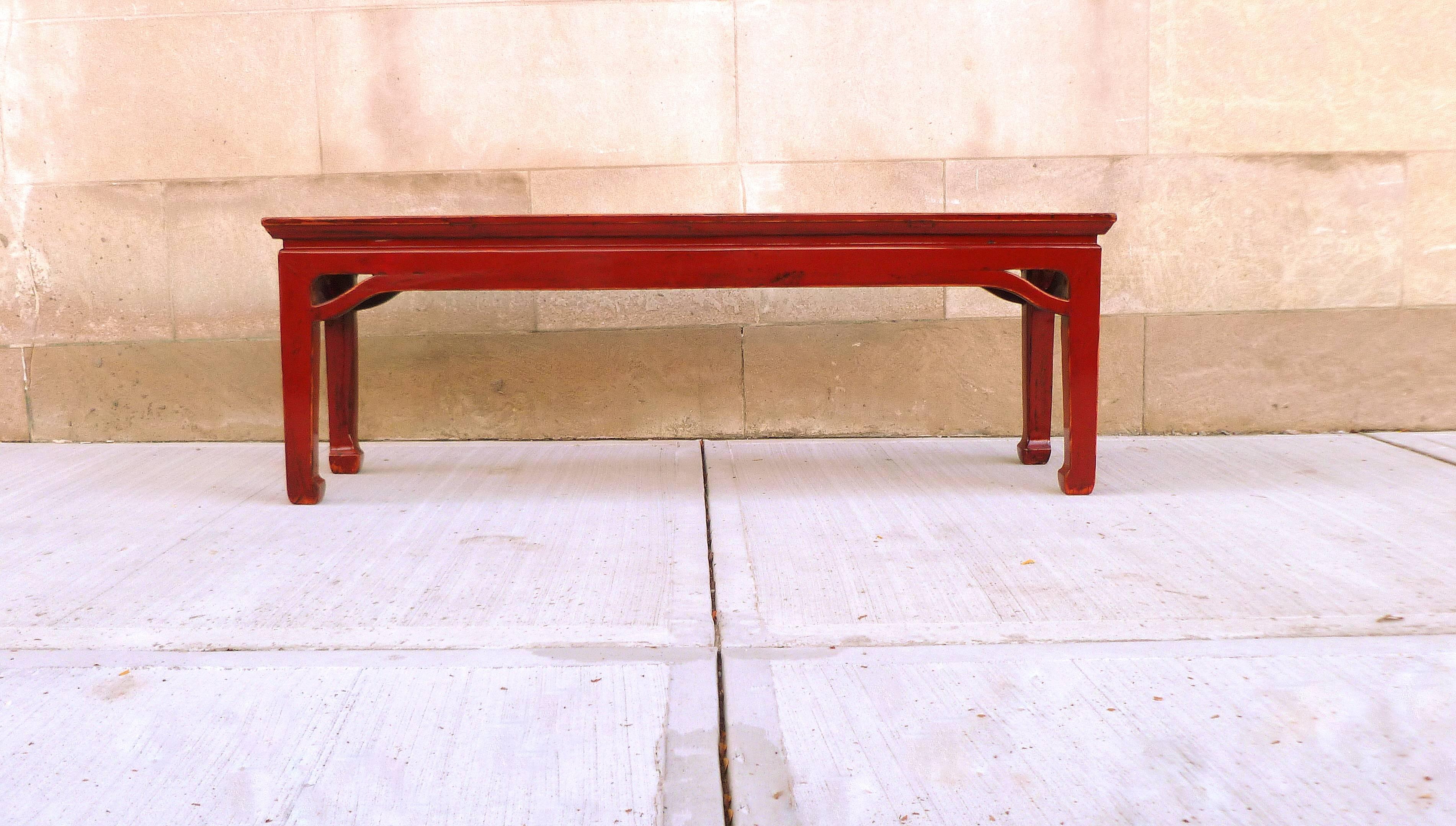 Red lacquer bench. Very elegant red lacquer bench, beautiful color and lines.