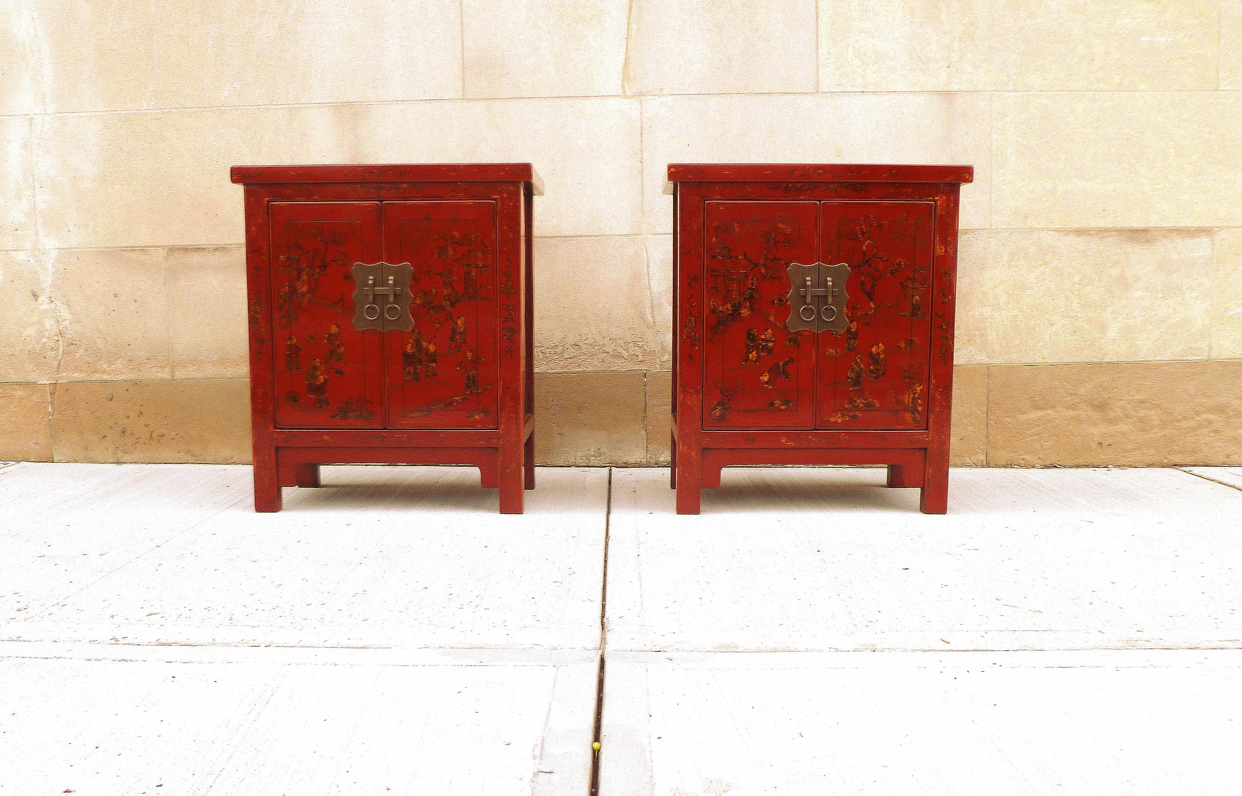 A pair of fine red lacquer chests with hand-painted gold gilt motif, beautiful color, form and lines.