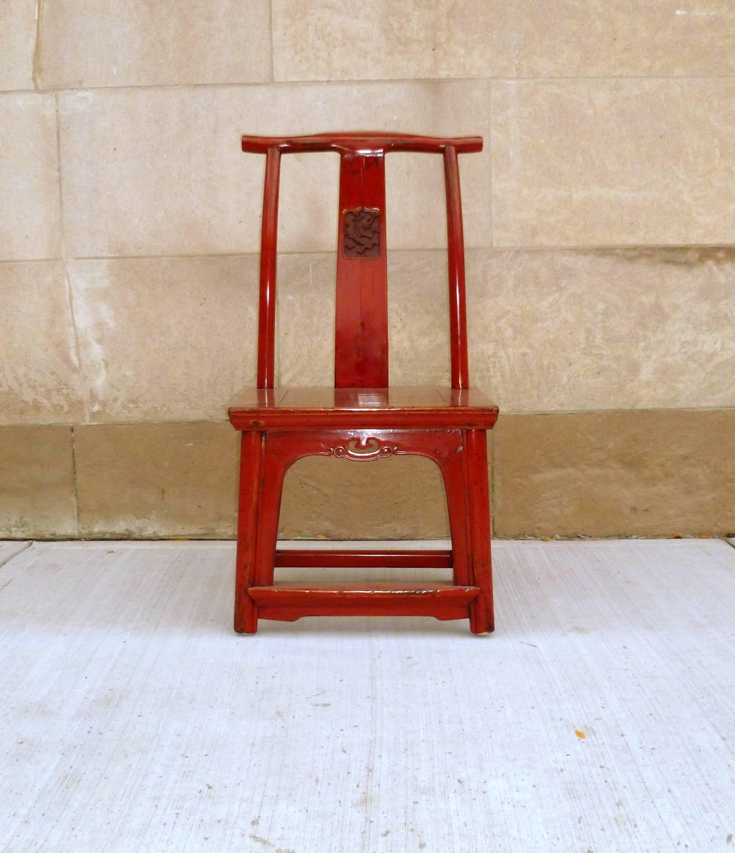 Beautiful red lacquer child's chair with fine pierce carving.
