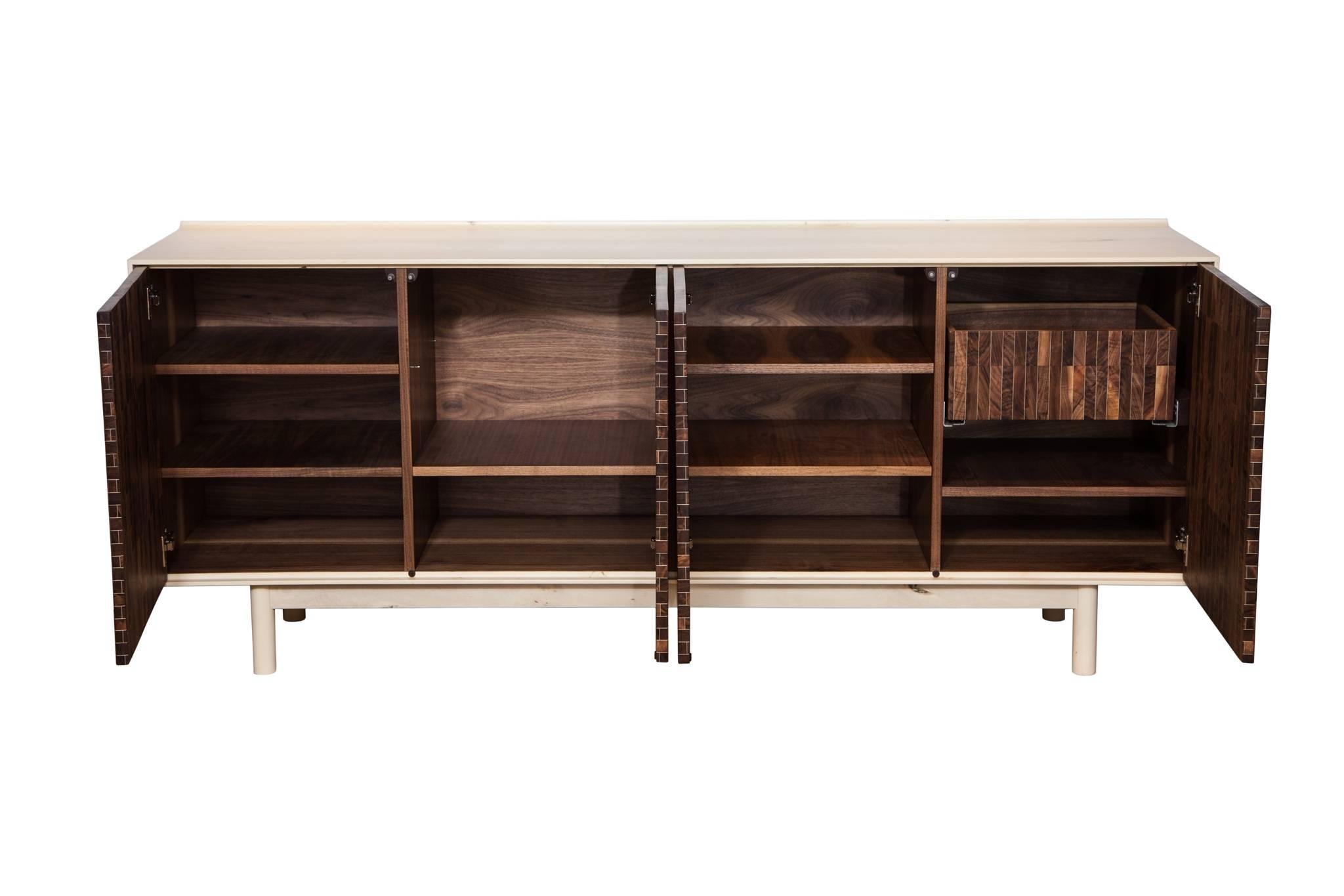 American holly cabinet with Klotzwrk's signature doors. Inset doors are made from crotch walnut blocks segmented by holly veneers.
Credenza can be ordered in custom sizes, wood species and finishes. 
By Klotzwrk.

Custom orders have a lead time