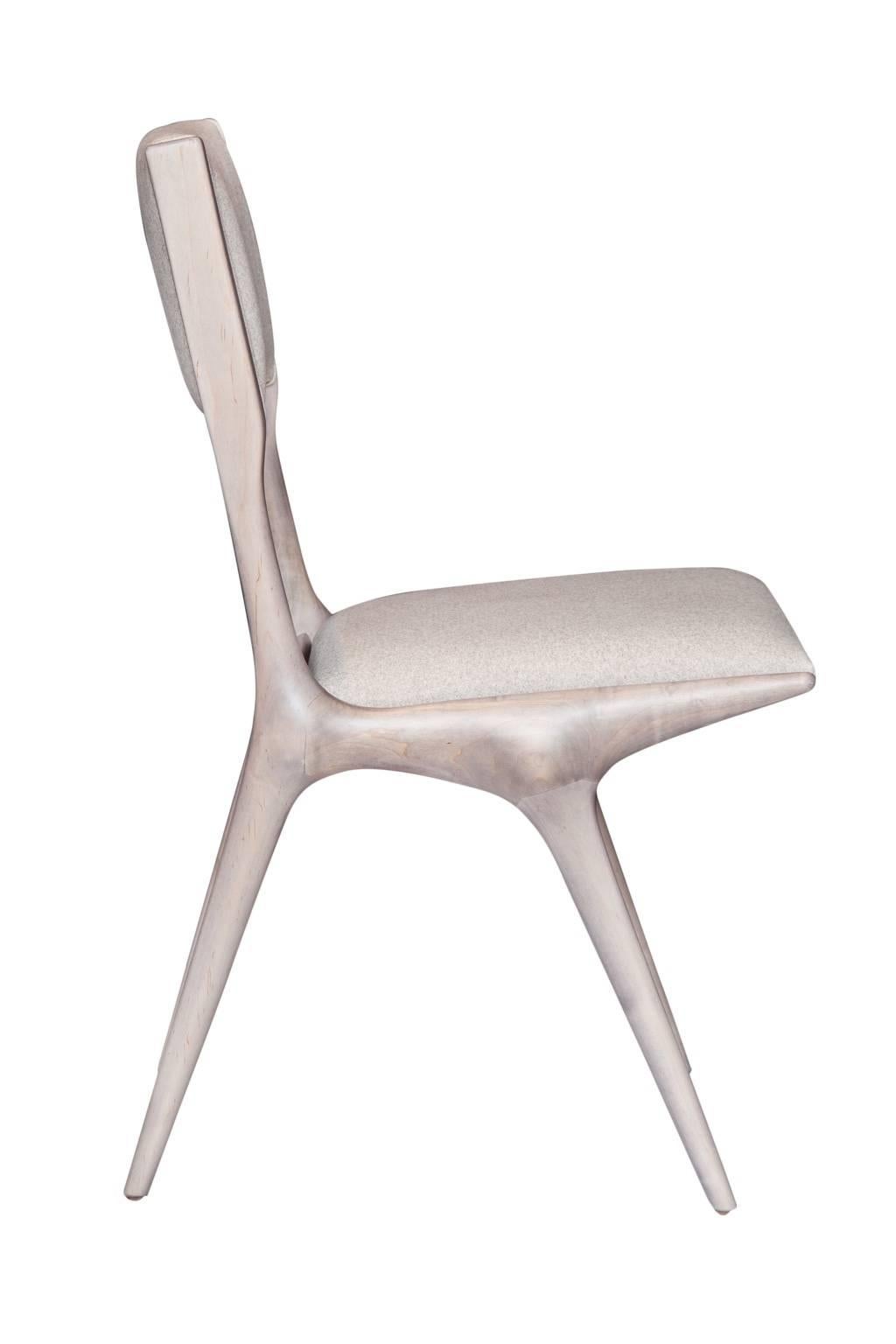 Maple dining chair in grey bleached finish.

Seat height-18.5”. 
Seat depth -16”. 
COM requirements: 1.5 yards. 
5% up-charge for contrasting fabrics and or welting. 
COL Requirements:30 sq. feet. 
5% percentage up-charge for all COL or